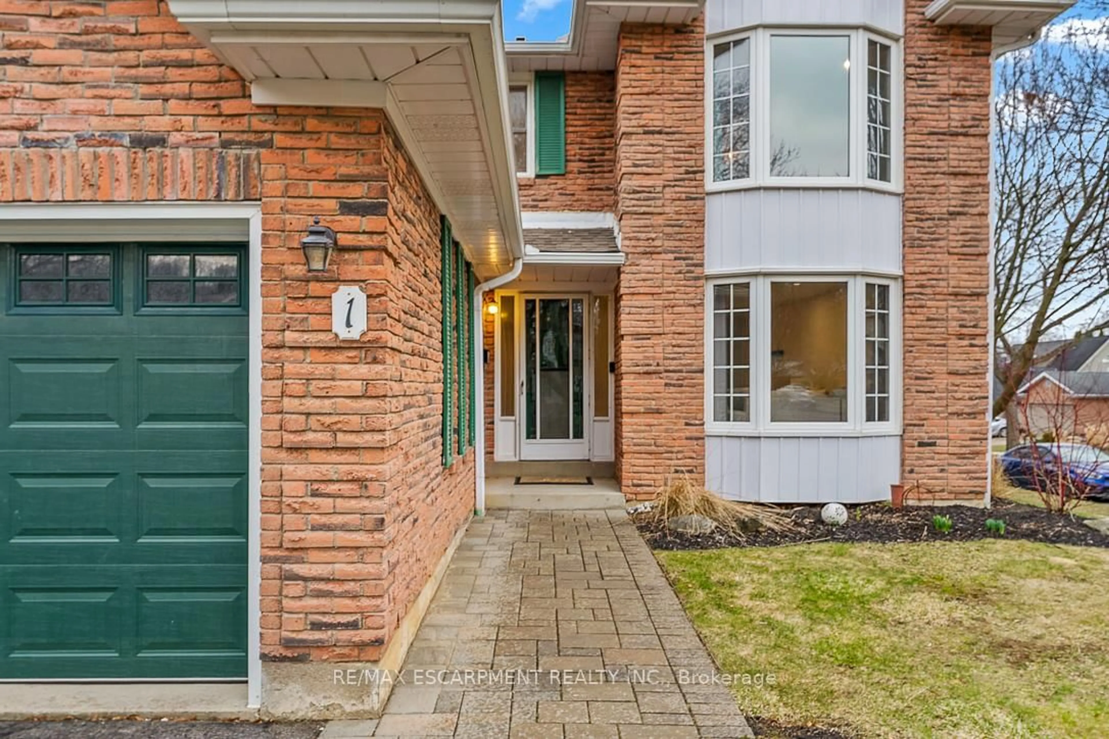 Home with brick exterior material, street for 1 PARKWAY Pl, Hamilton Ontario L9H 6K3