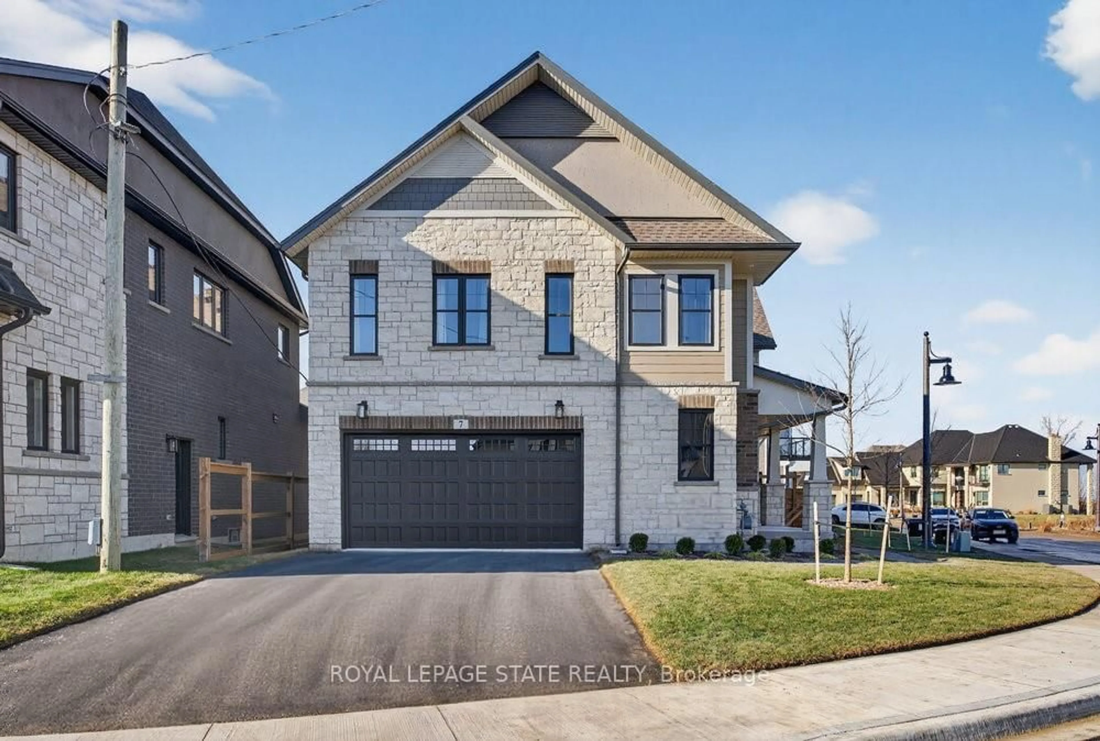 Home with brick exterior material, street for 100 Watershore Dr #7, Hamilton Ontario L8E 0C1