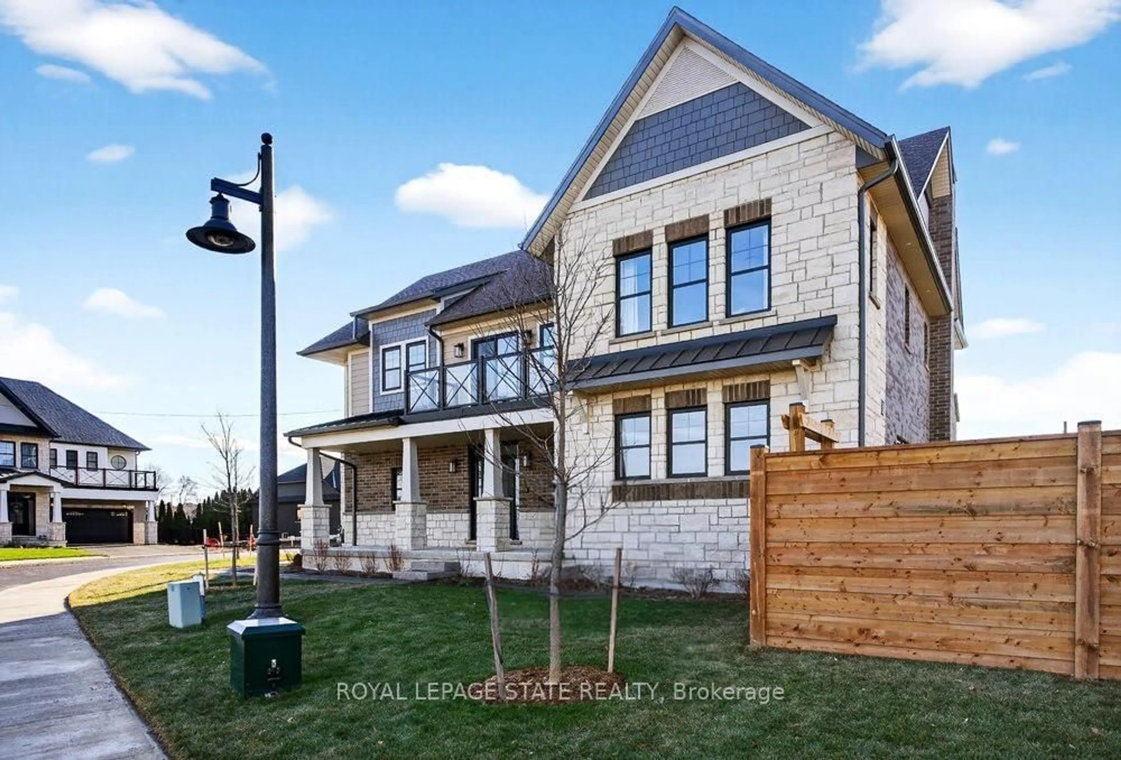 Home with brick exterior material, street for 100 Watershore Dr #7, Hamilton Ontario L8E 0C1