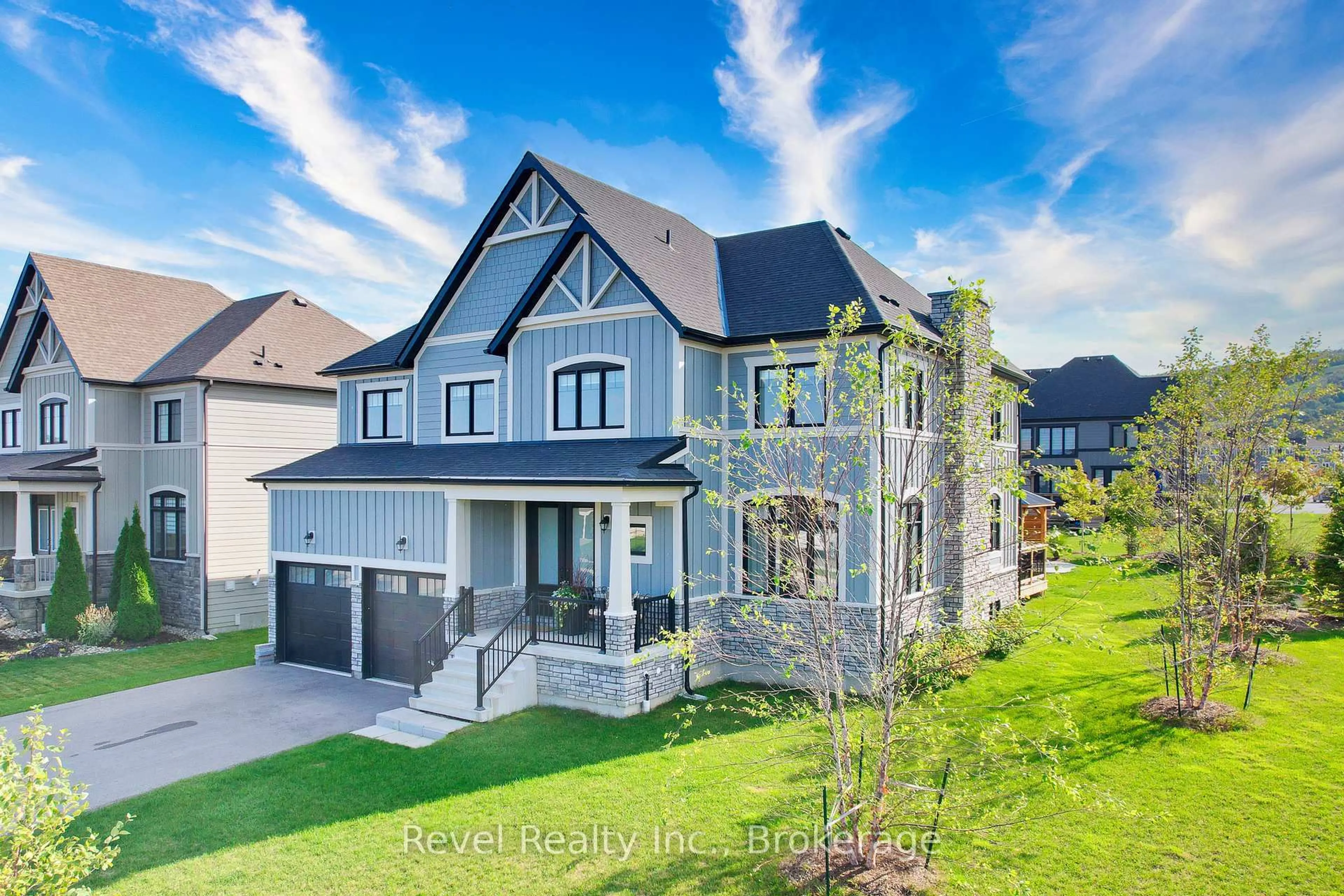 Home with brick exterior material, street for 101 Reed Way, Blue Mountains Ontario L9Y 0V1