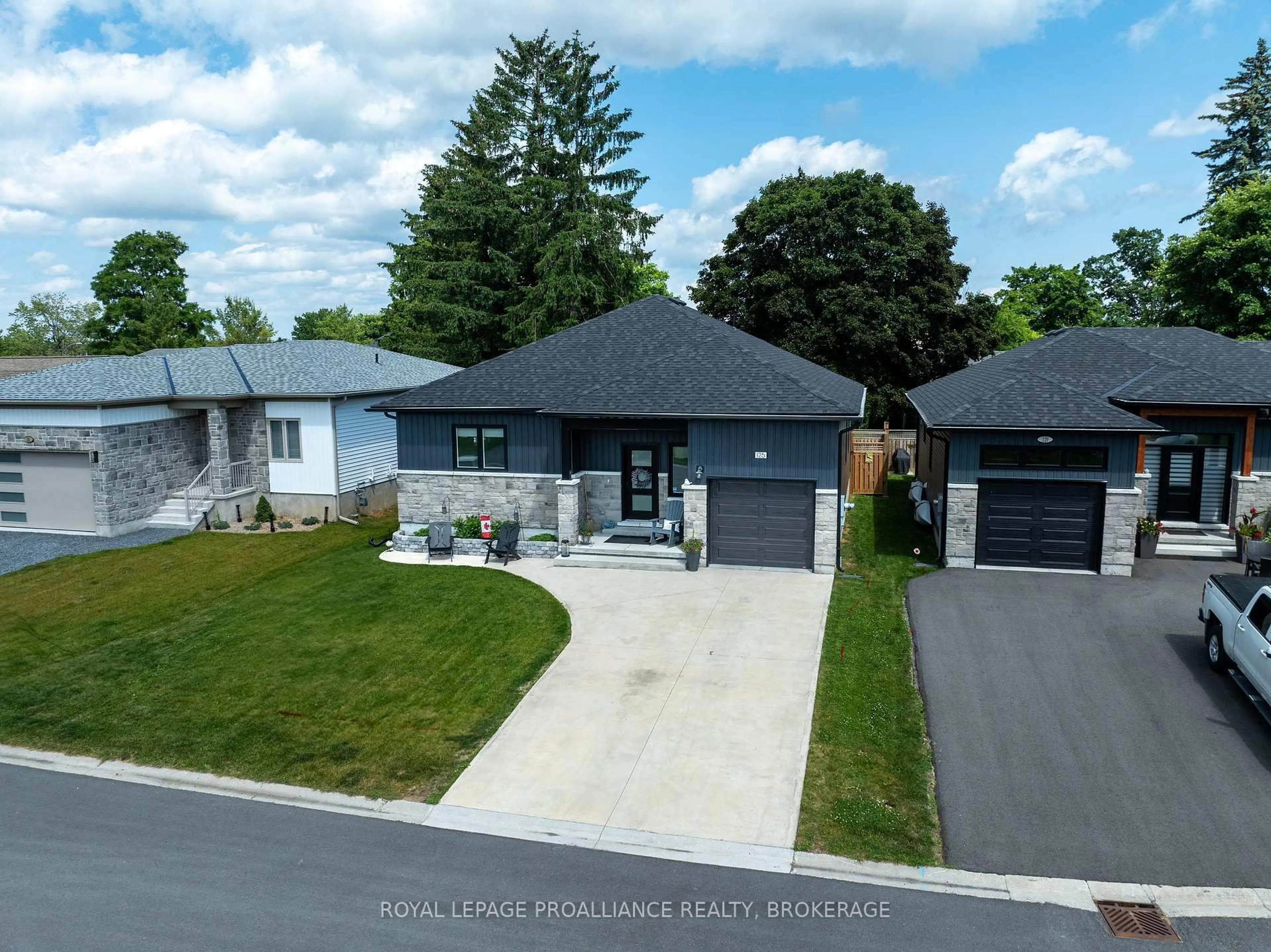 A pic from outside/outdoor area/front of a property/back of a property/a pic from drone, street for 125 Maplecroft Crt, Gananoque Ontario K7G 0A6