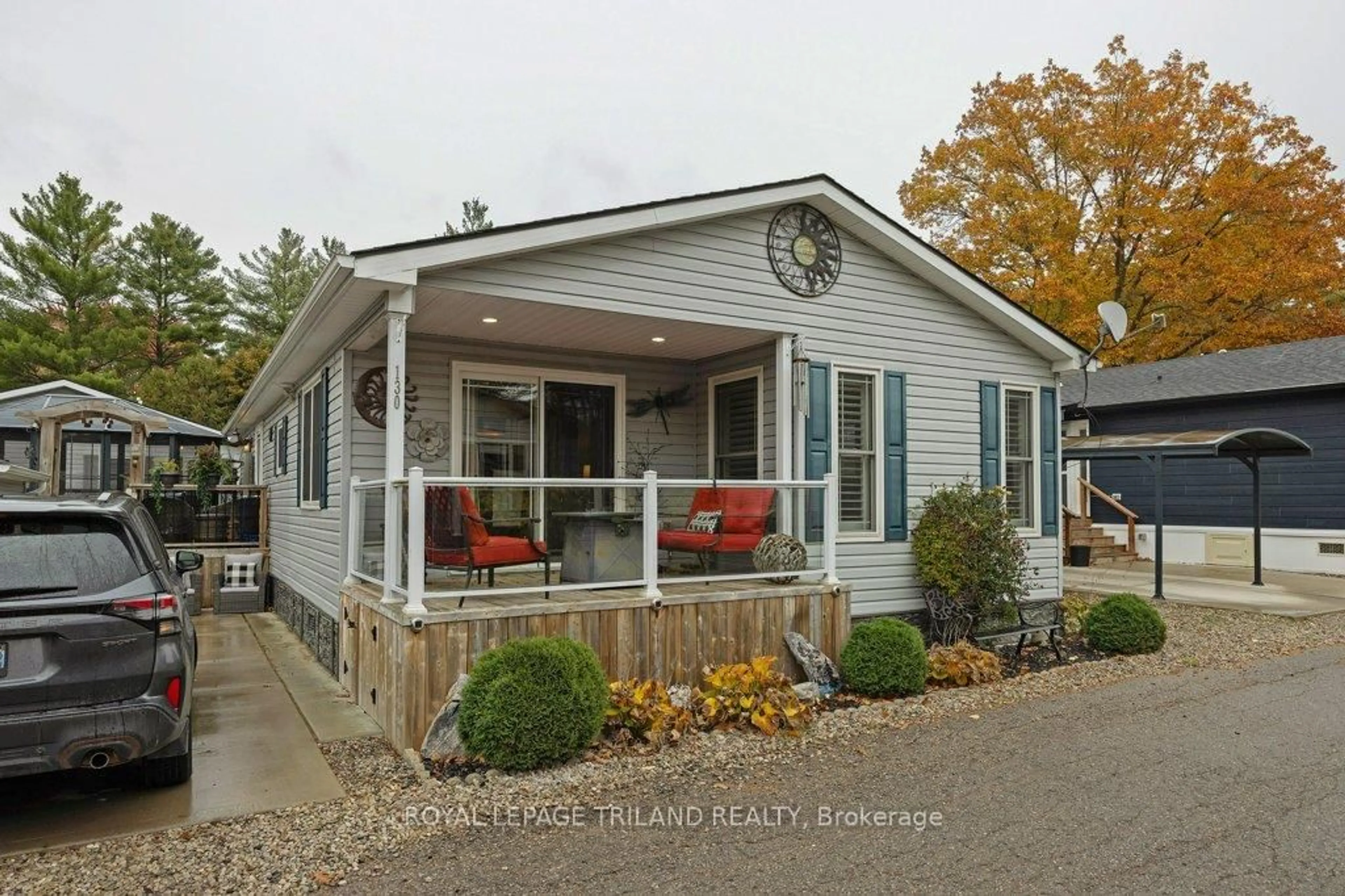 Home with vinyl exterior material, street for 22790 AMIENS Rd #130, Middlesex Centre Ontario N0L 1R0