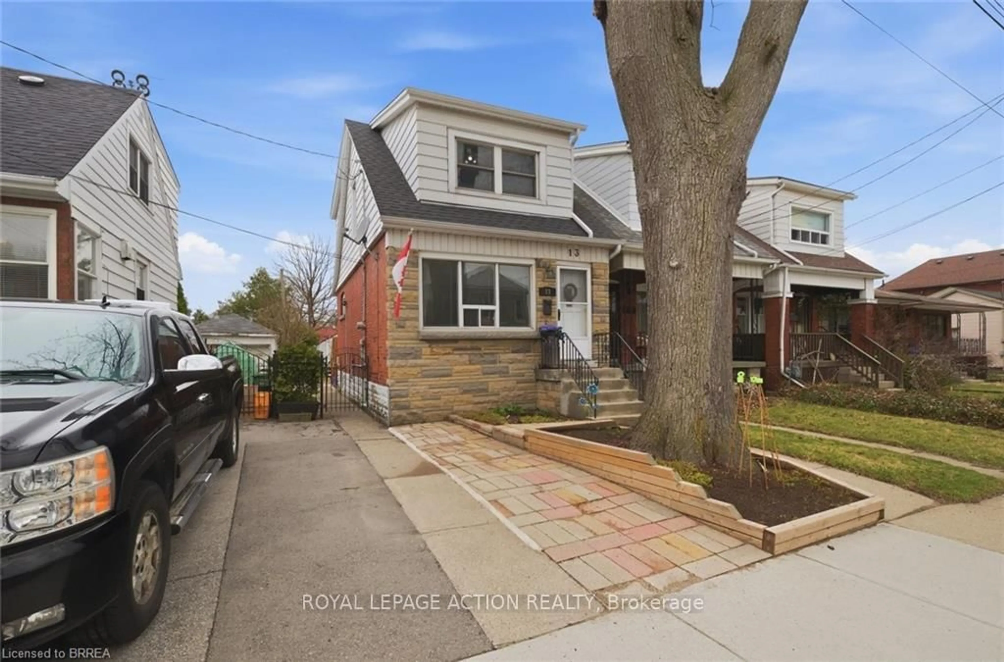 Home with brick exterior material, street for 13 Devonport St, Hamilton Ontario L8R 3C5