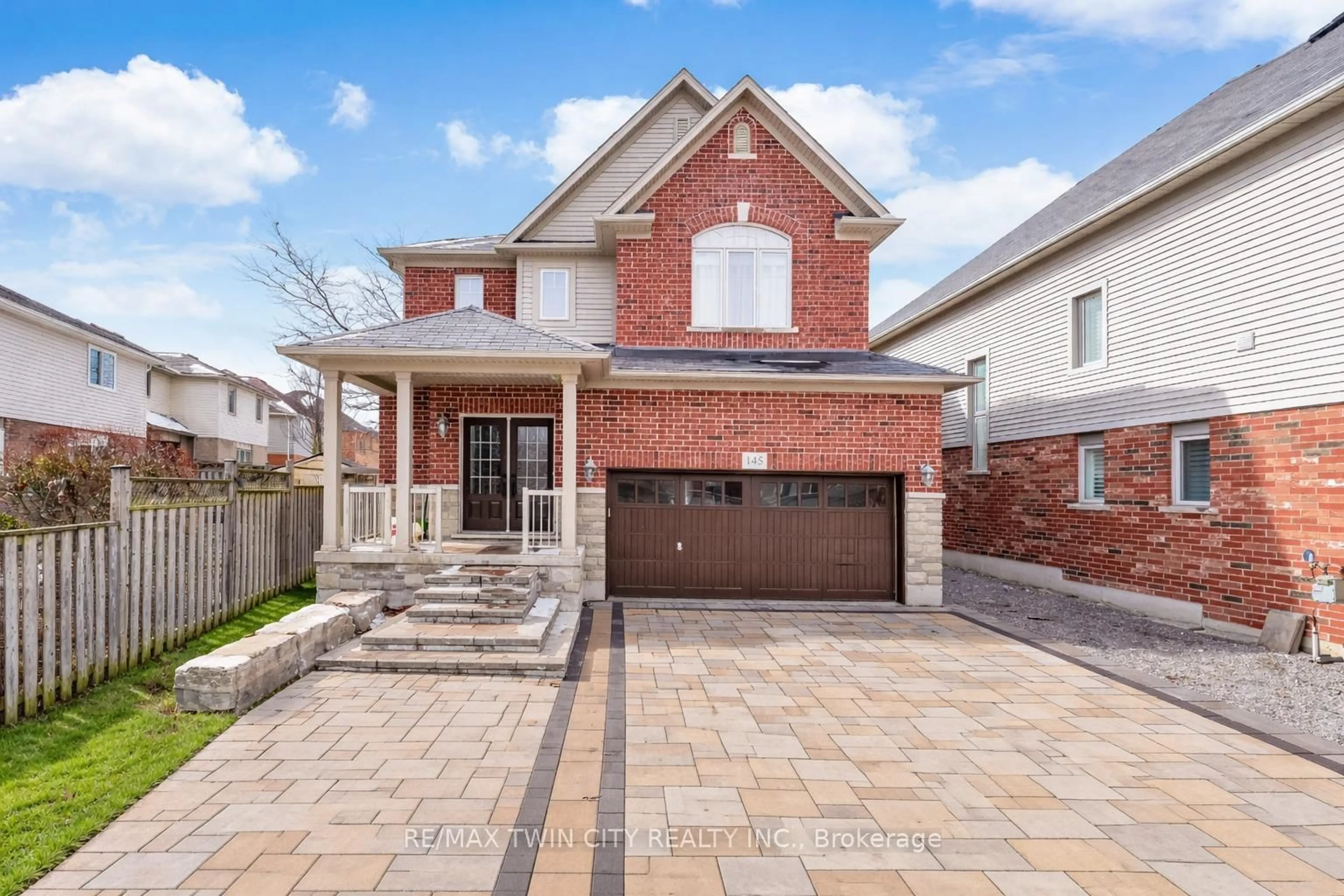 Home with brick exterior material, street for 145 Redtail St, Kitchener Ontario N2K 4J5