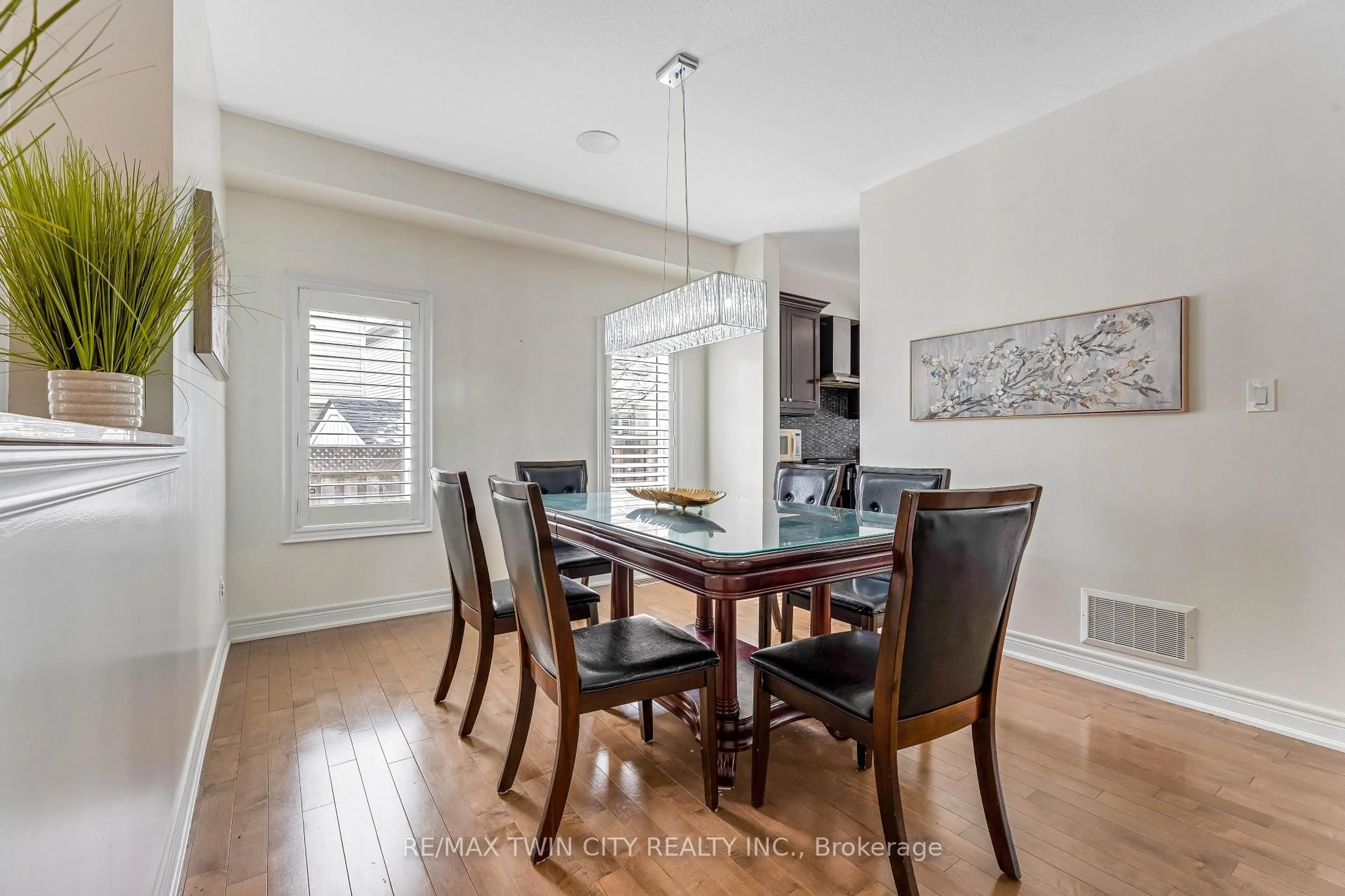 Dining room, wood/laminate floor for 145 Redtail St, Kitchener Ontario N2K 4J5