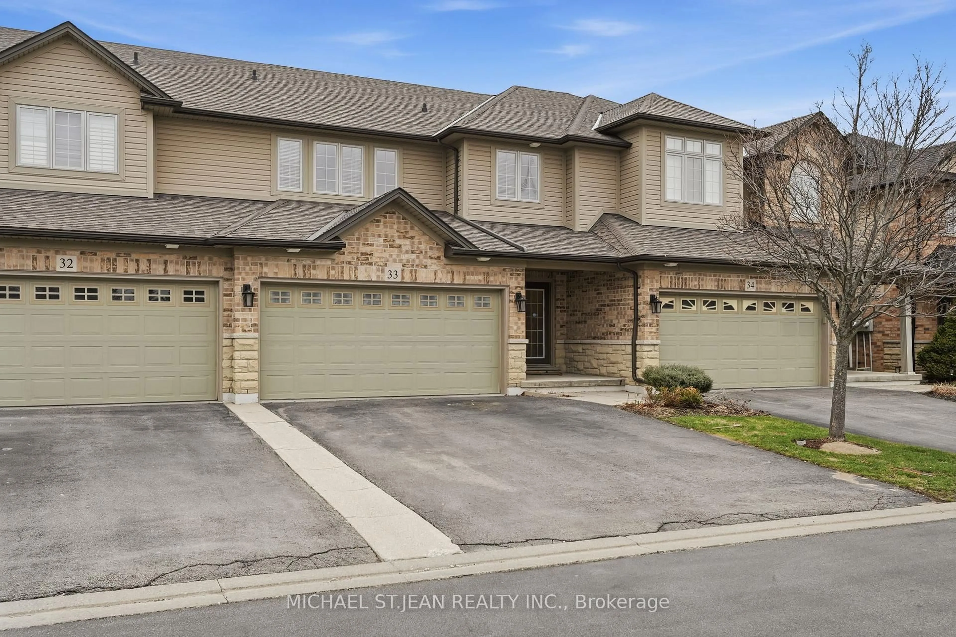 A pic from outside/outdoor area/front of a property/back of a property/a pic from drone, street for 441 Stonehenge Dr #33, Hamilton Ontario L9K 0B1