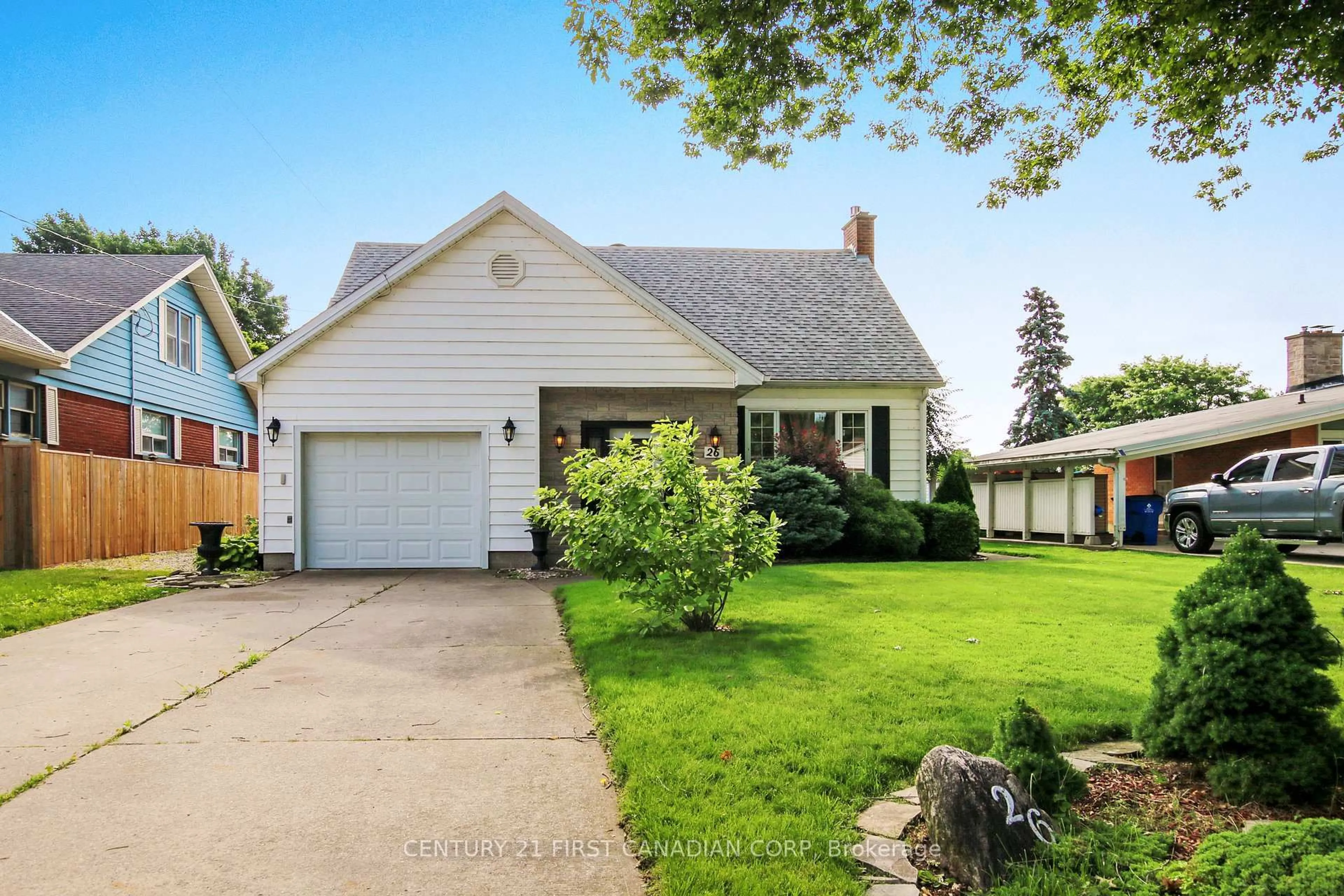 Home with vinyl exterior material, street for 26 Grand Ave, Chatham-Kent Ontario N8A 4J9