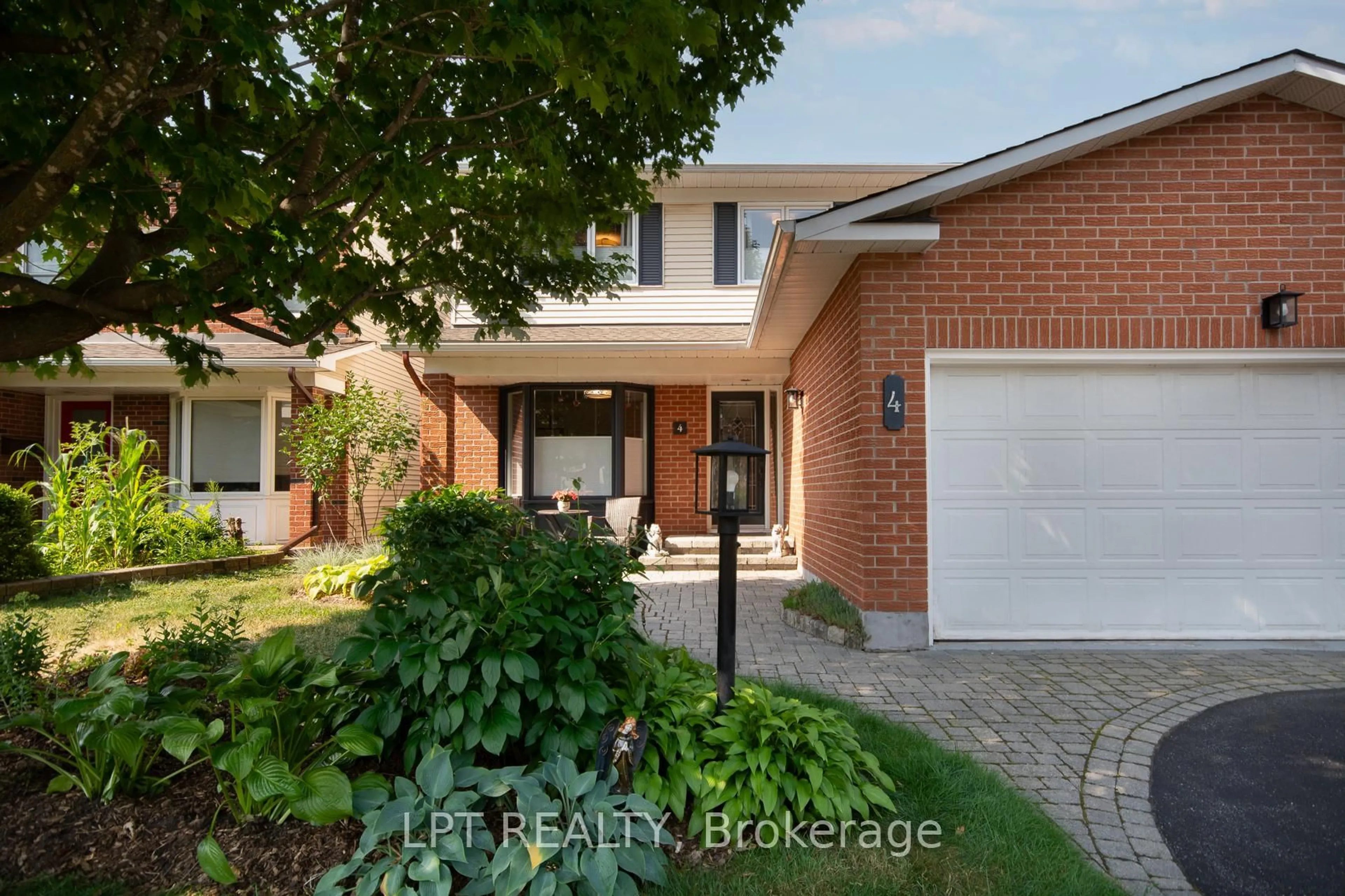 Home with brick exterior material, street for 4 Drainie Dr, Ottawa Ontario K2L 3J5