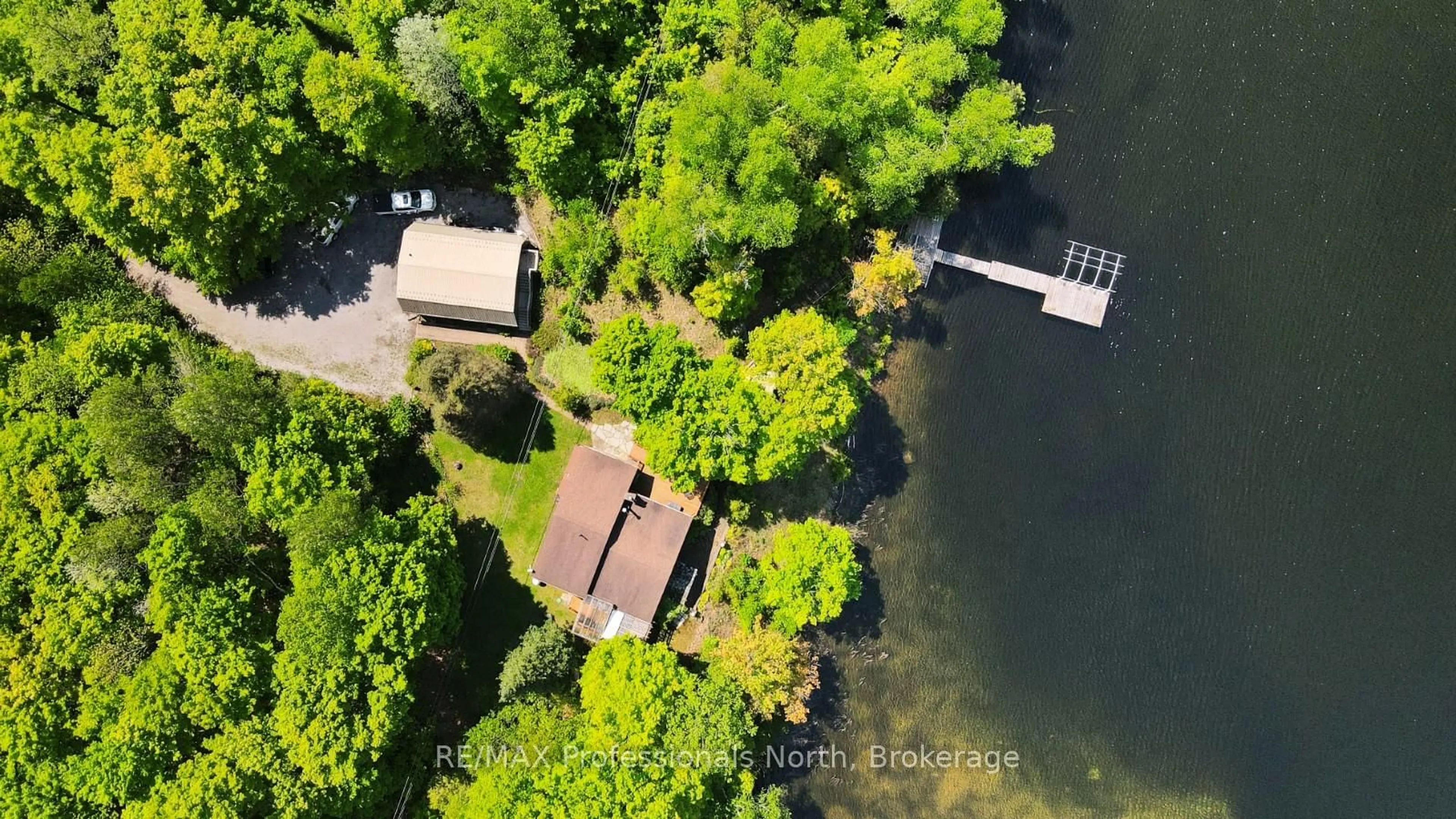 A pic from outside/outdoor area/front of a property/back of a property/a pic from drone, water/lake/river/ocean view for 1943 Essonville Line, Highlands East Ontario K0L 2Y0