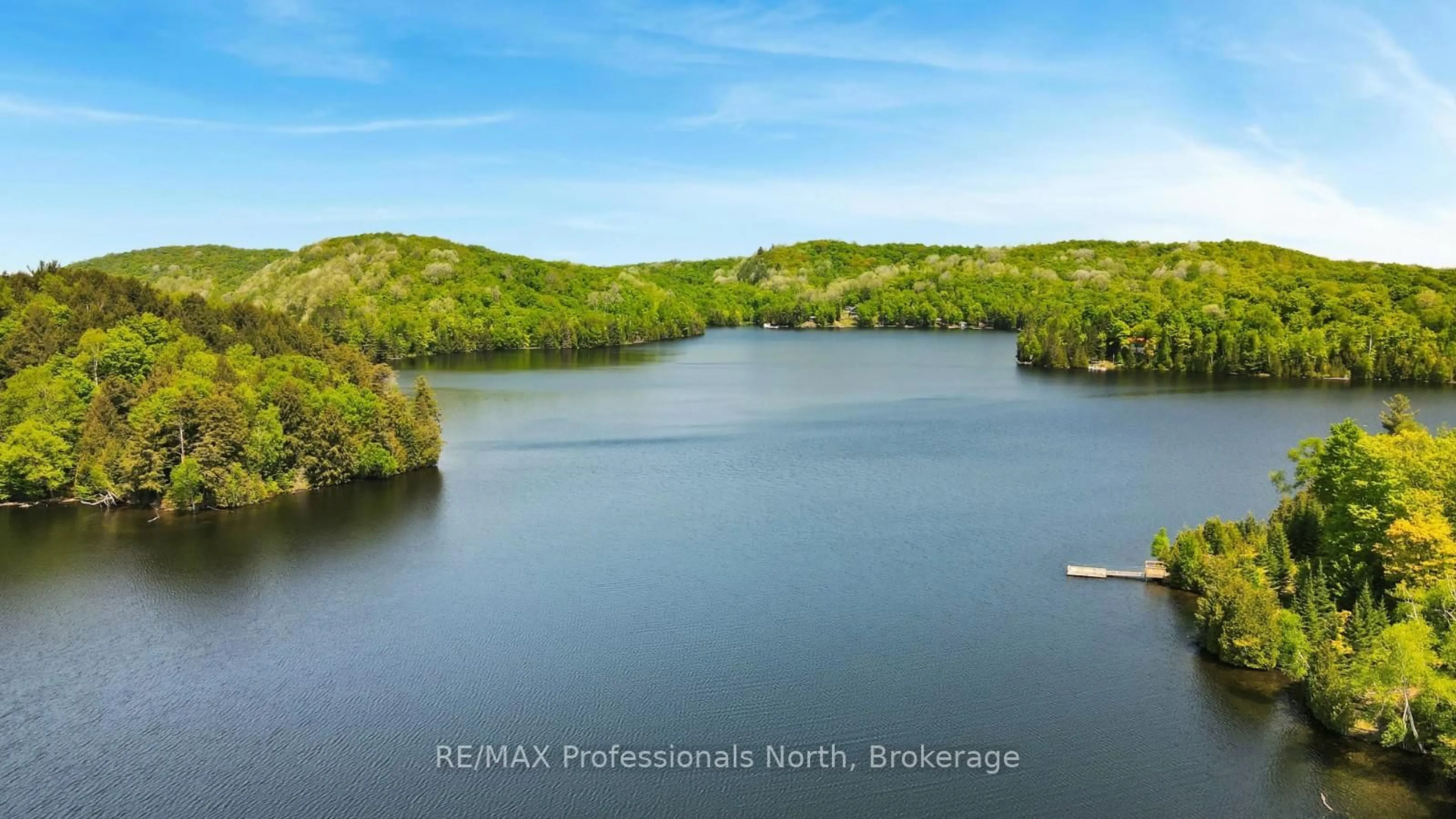 A pic from outside/outdoor area/front of a property/back of a property/a pic from drone, water/lake/river/ocean view for 1943 Essonville Line, Highlands East Ontario K0L 2Y0