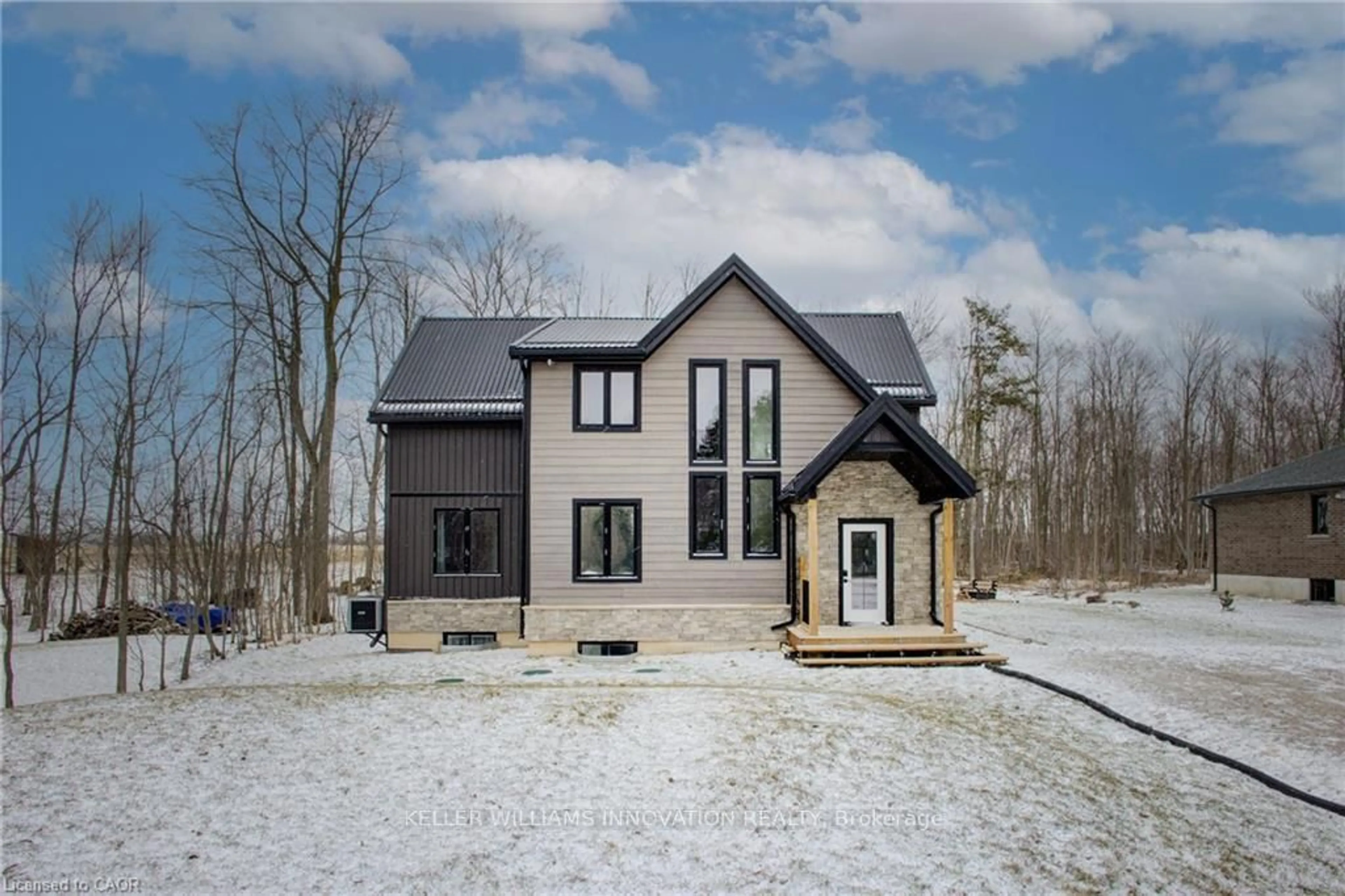 Home with brick exterior material, unknown for 74362 Driftwood Dr, Bluewater Ontario N0M 1G0