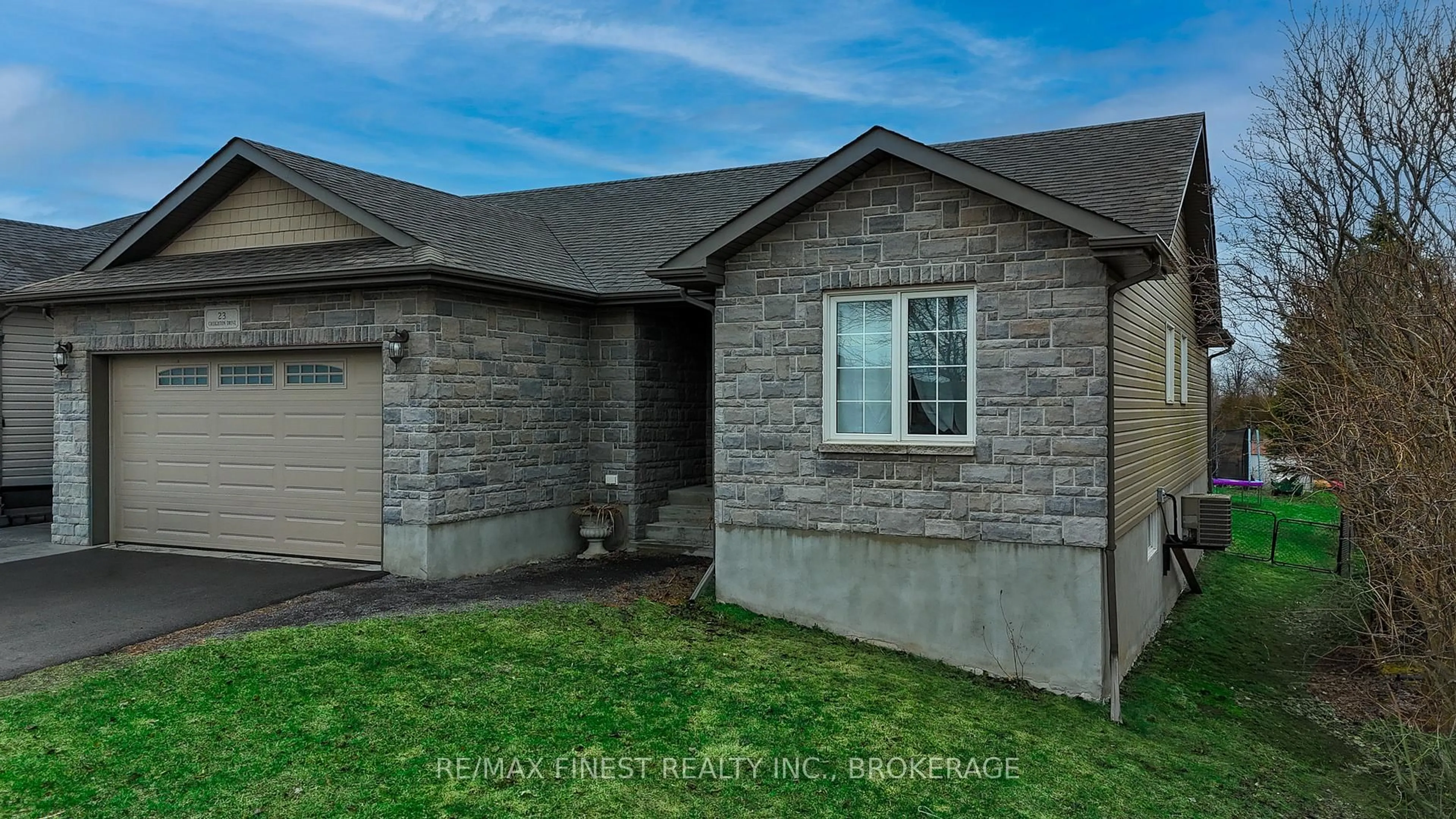 Home with brick exterior material, street for 23 Creighton Dr, Bissett Creek Ontario K0H 2H0
