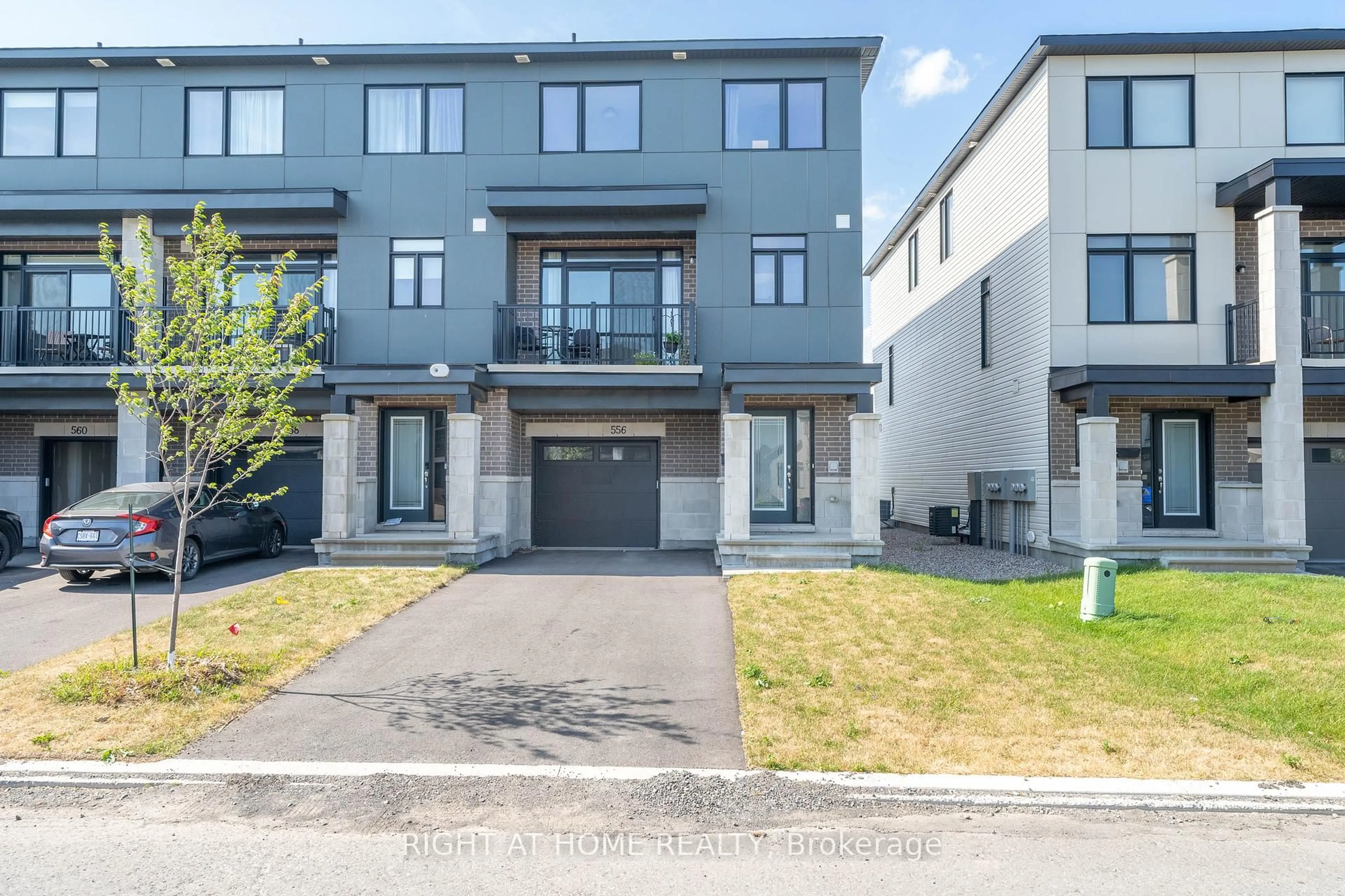 A pic from outside/outdoor area/front of a property/back of a property/a pic from drone, street for 556 Tahoe Hts, Ottawa Ontario K1T 0X5