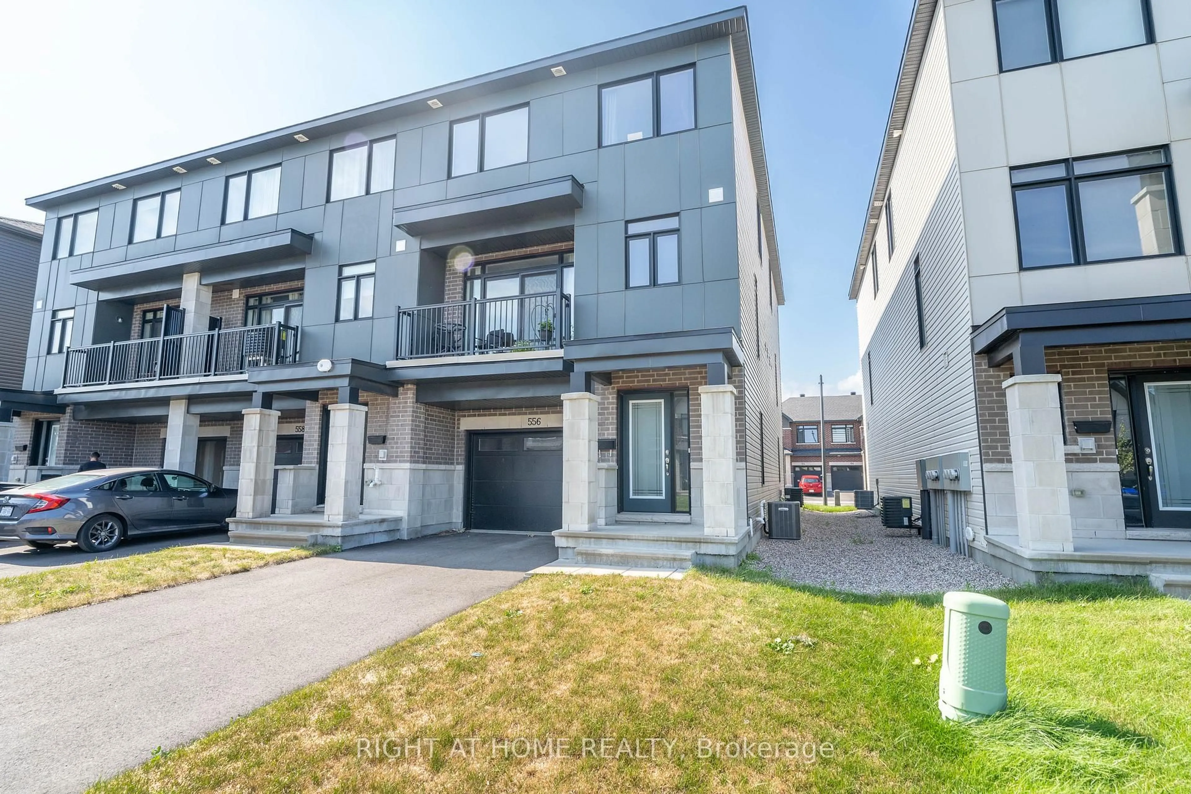 A pic from outside/outdoor area/front of a property/back of a property/a pic from drone, street for 556 Tahoe Hts, Ottawa Ontario K1T 0X5