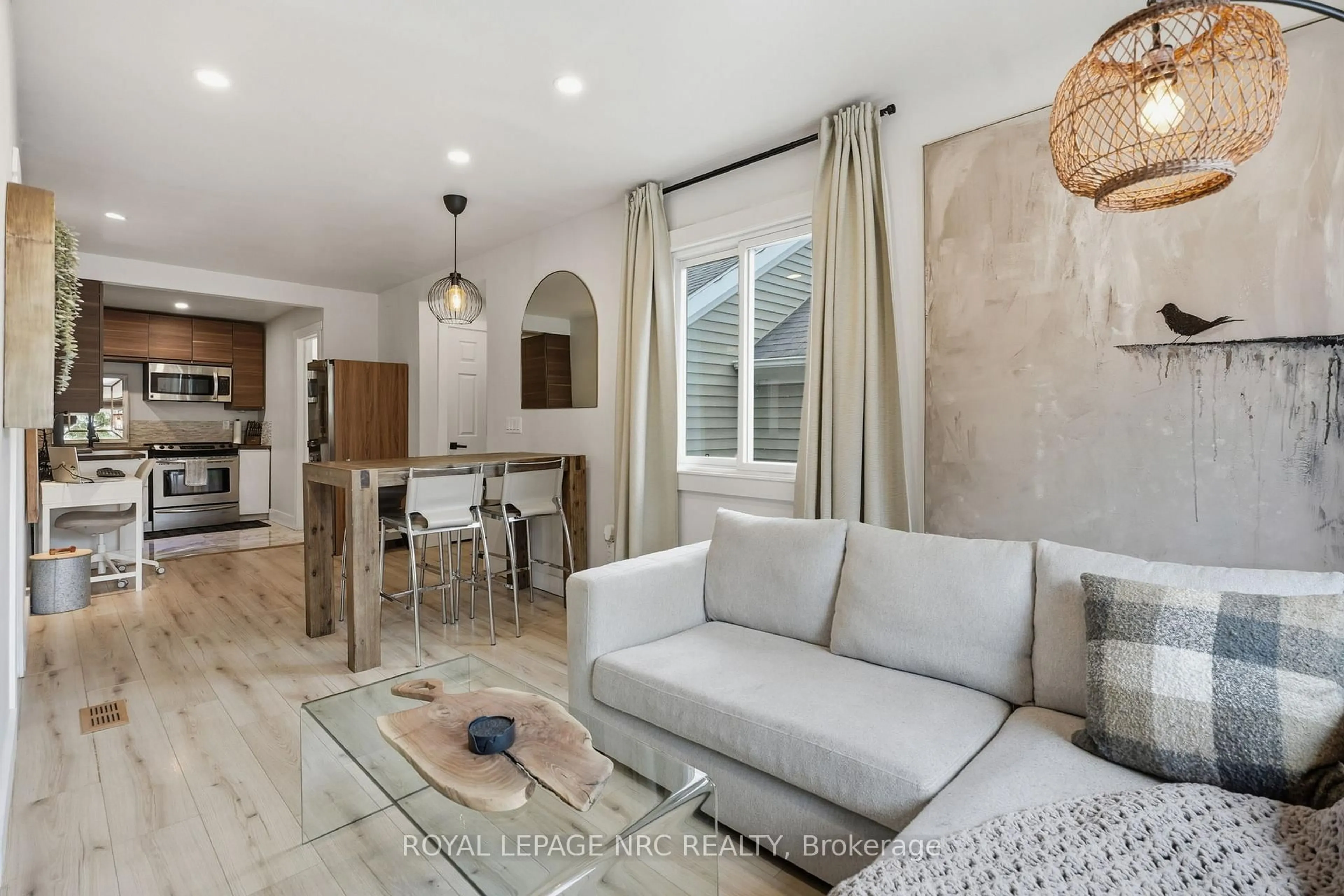 Living room with furniture, ceramic/tile floor for 17 Considine Ave, St. Catharines Ontario L2N 5K1