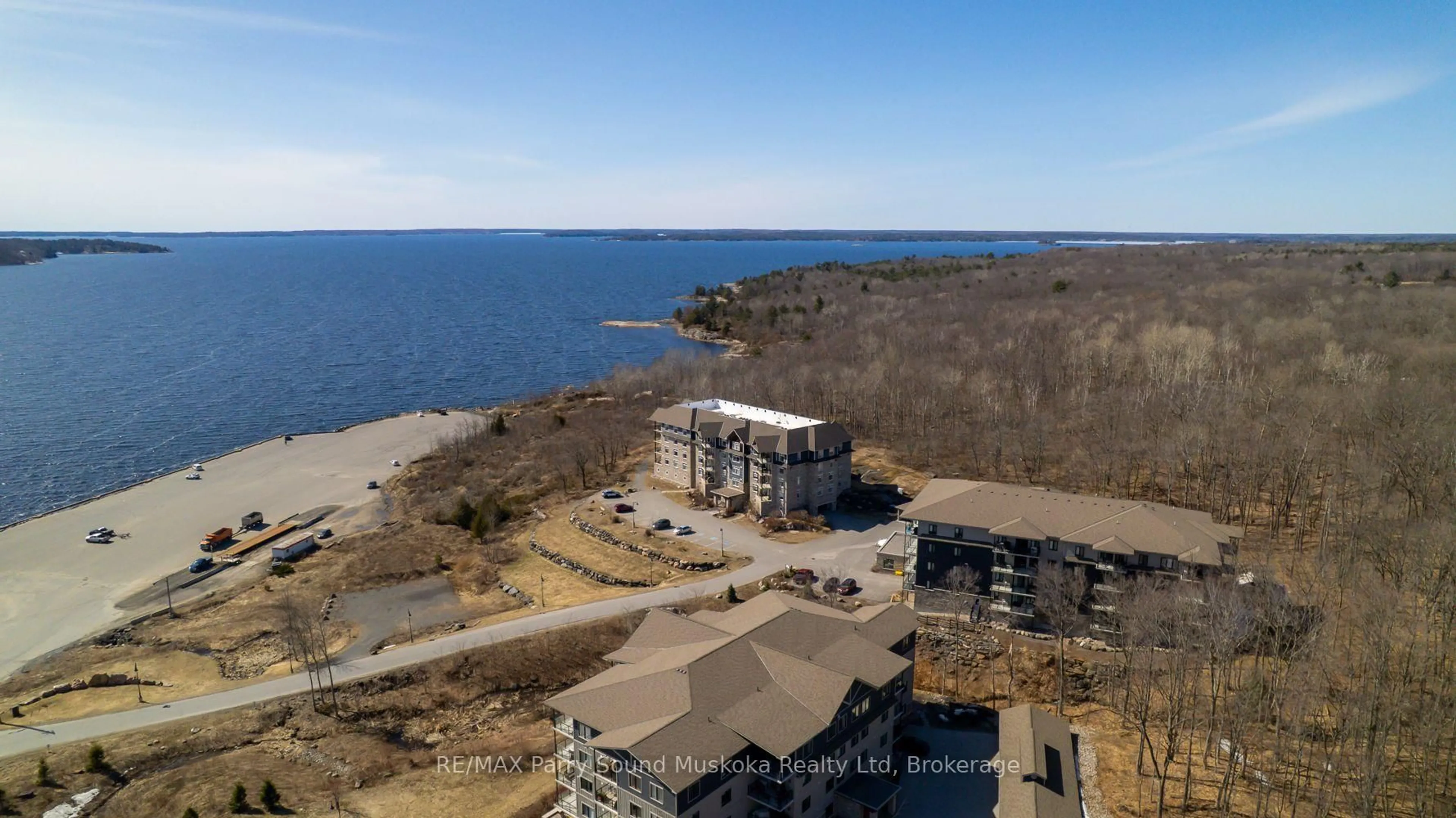 A pic from outside/outdoor area/front of a property/back of a property/a pic from drone, water/lake/river/ocean view for 11B Salt Dock Rd #401, Parry Sound Ontario P2A 3B6