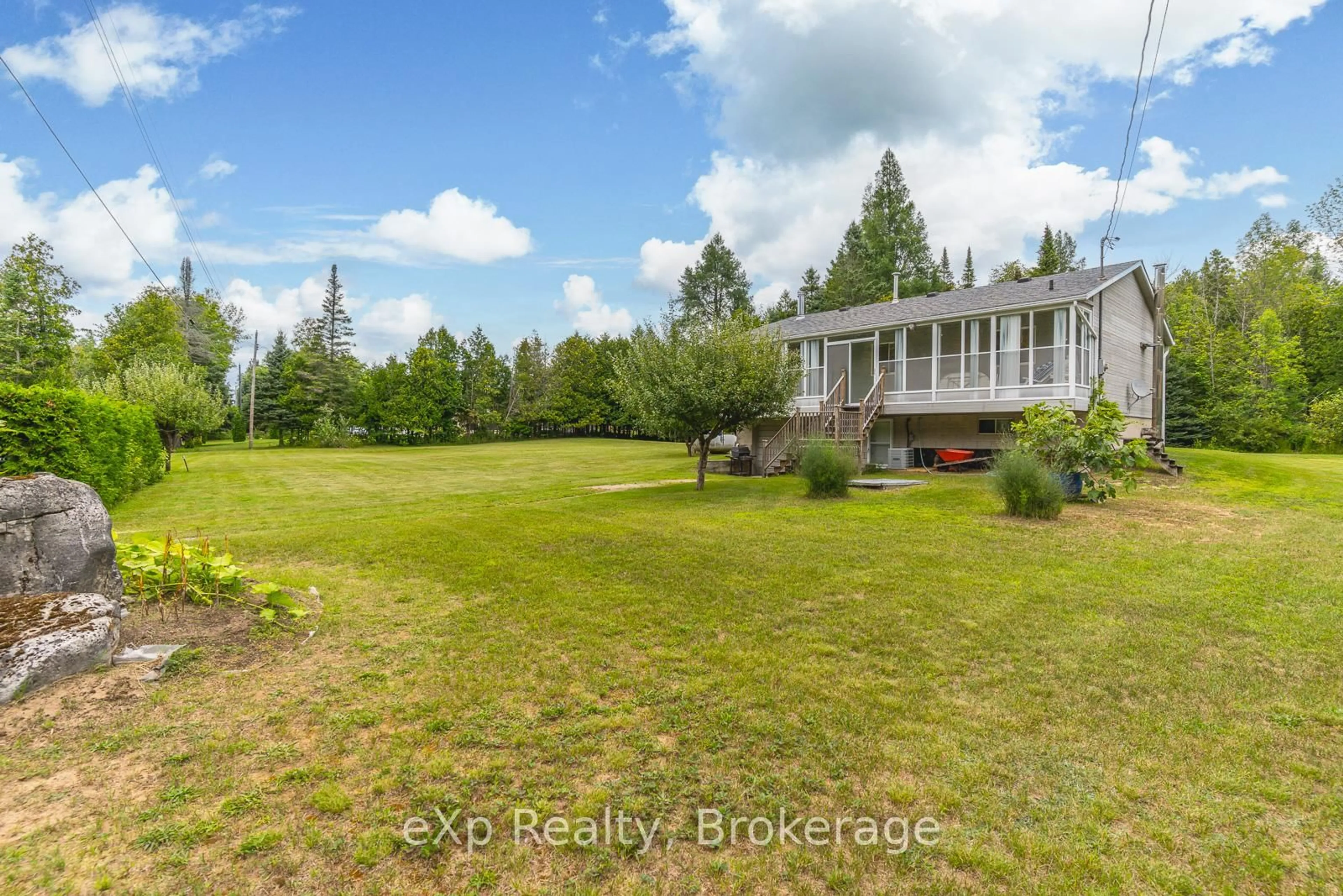 A pic from outside/outdoor area/front of a property/back of a property/a pic from drone, water/lake/river/ocean view for 27 Bell Dr, Northern Bruce Peninsula Ontario N0H 2T0