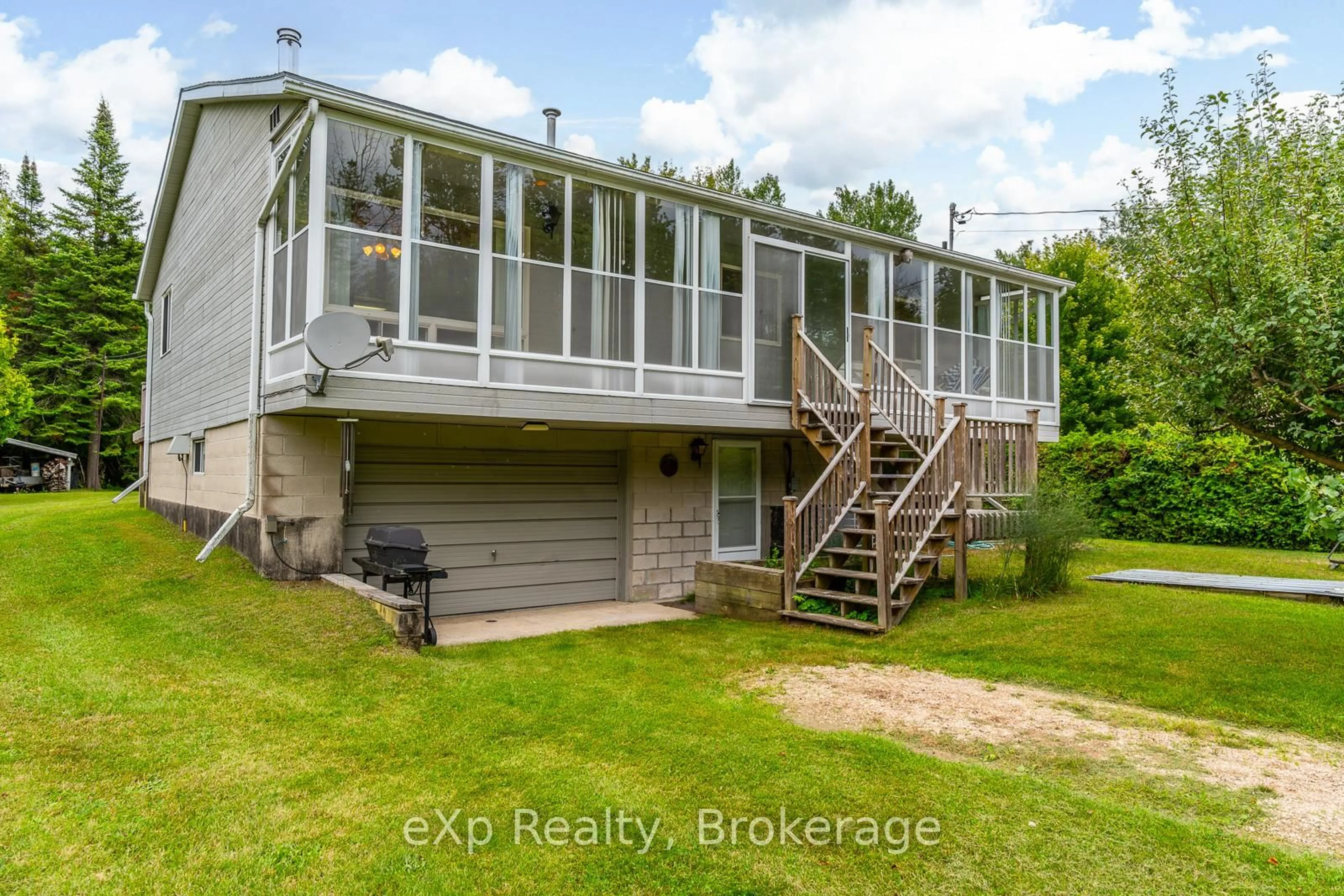 A pic from outside/outdoor area/front of a property/back of a property/a pic from drone, water/lake/river/ocean view for 27 Bell Dr, Northern Bruce Peninsula Ontario N0H 2T0