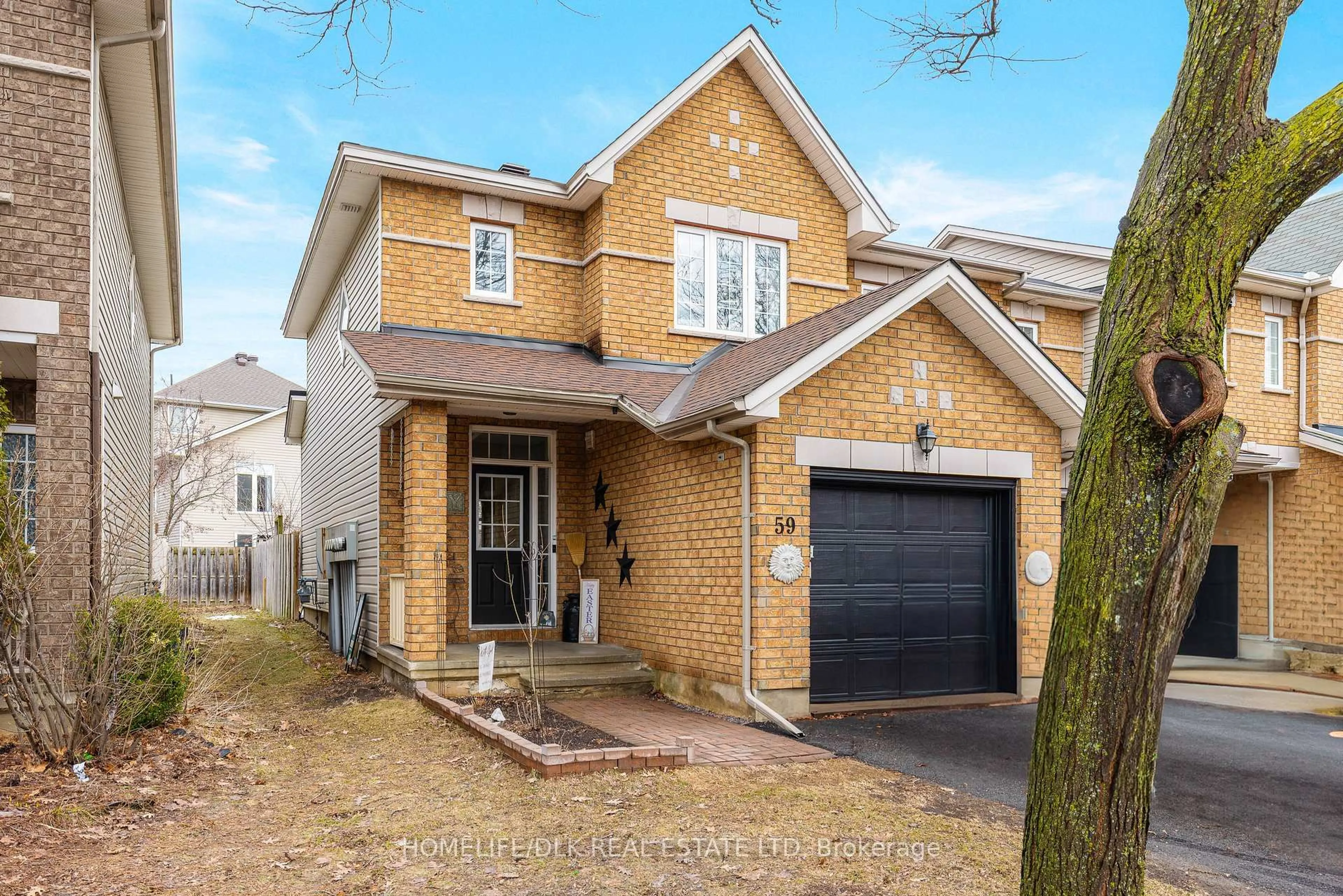 Home with brick exterior material, street for 59 Saddlesmith Circ, Ottawa Ontario K2M 2Y9