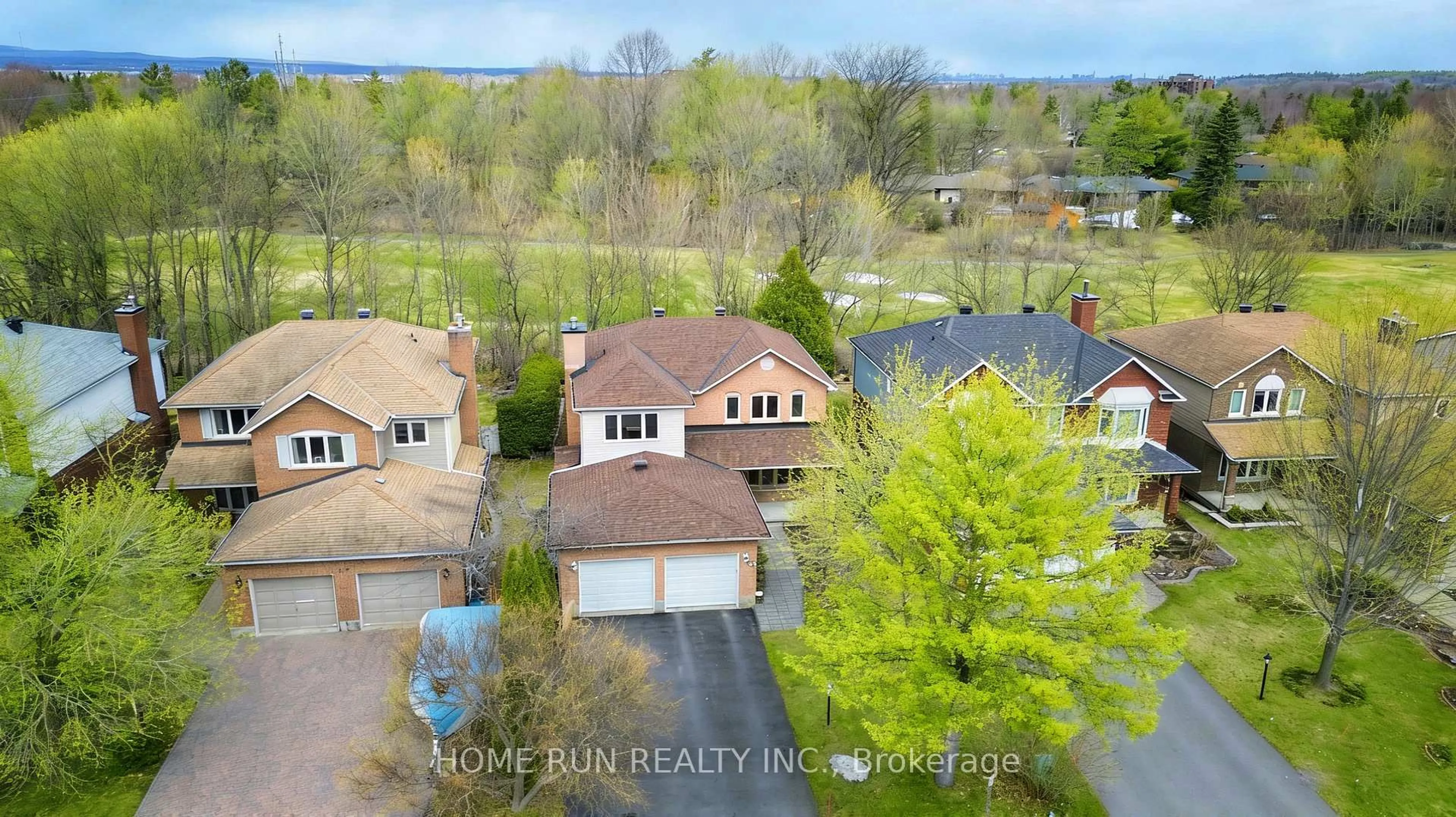 A pic from outside/outdoor area/front of a property/back of a property/a pic from drone, water/lake/river/ocean view for 35 Weslock Way, Ottawa Ontario K2K 2K3
