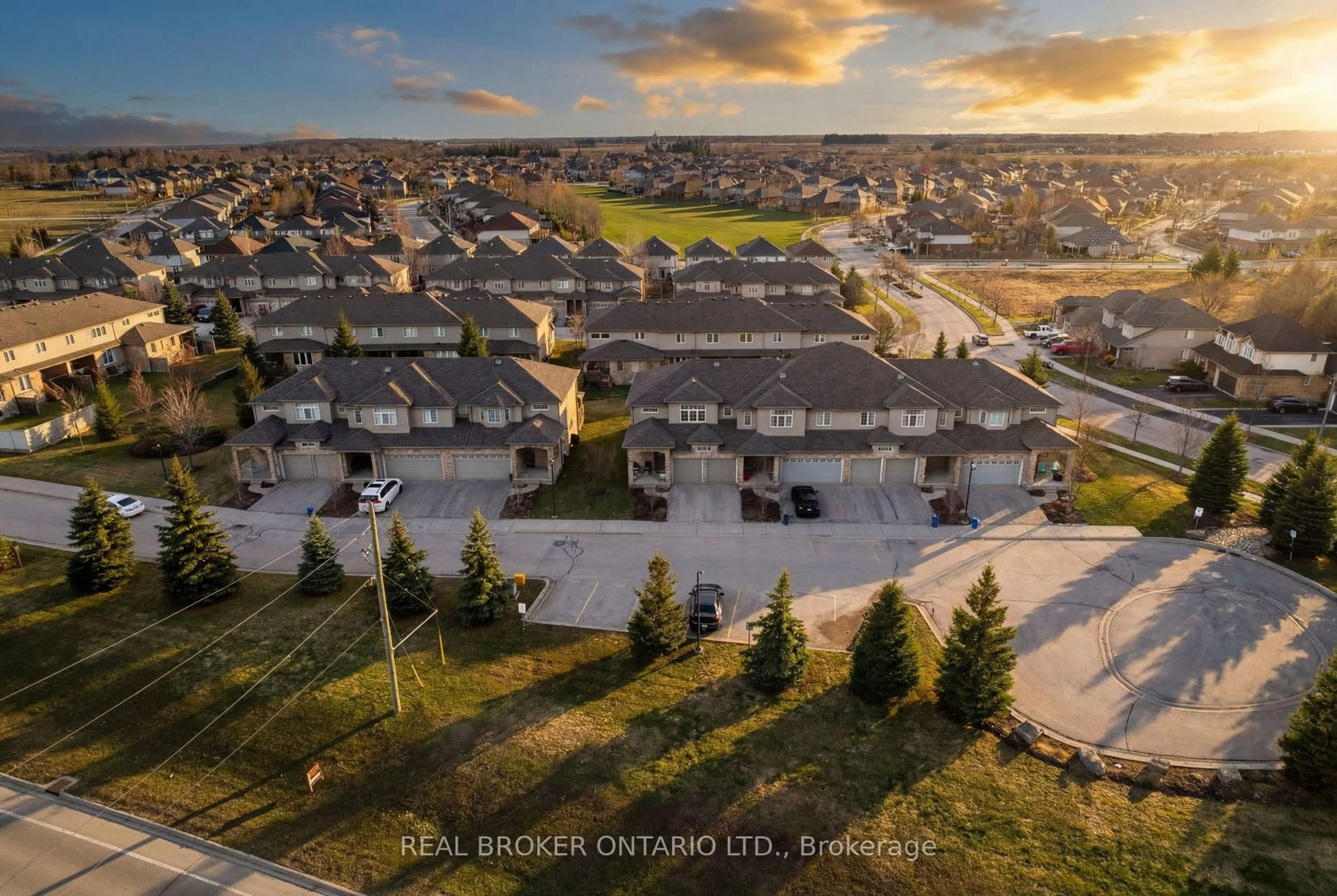 A pic from outside/outdoor area/front of a property/back of a property/a pic from drone, street for 31 Townsend Dr #66, Woolwich Ontario N0B 1M0