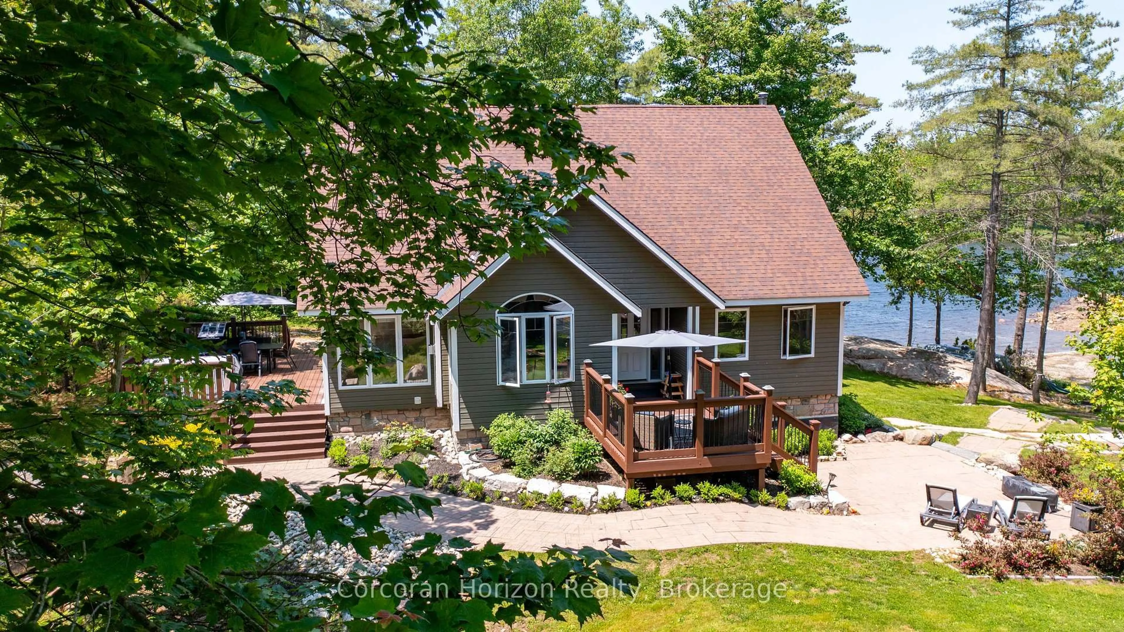 A pic from outside/outdoor area/front of a property/back of a property/a pic from drone, water/lake/river/ocean view for 100 ISLAND 630 GEORGIAN BAY, Georgian Bay Ontario P0E 1E0
