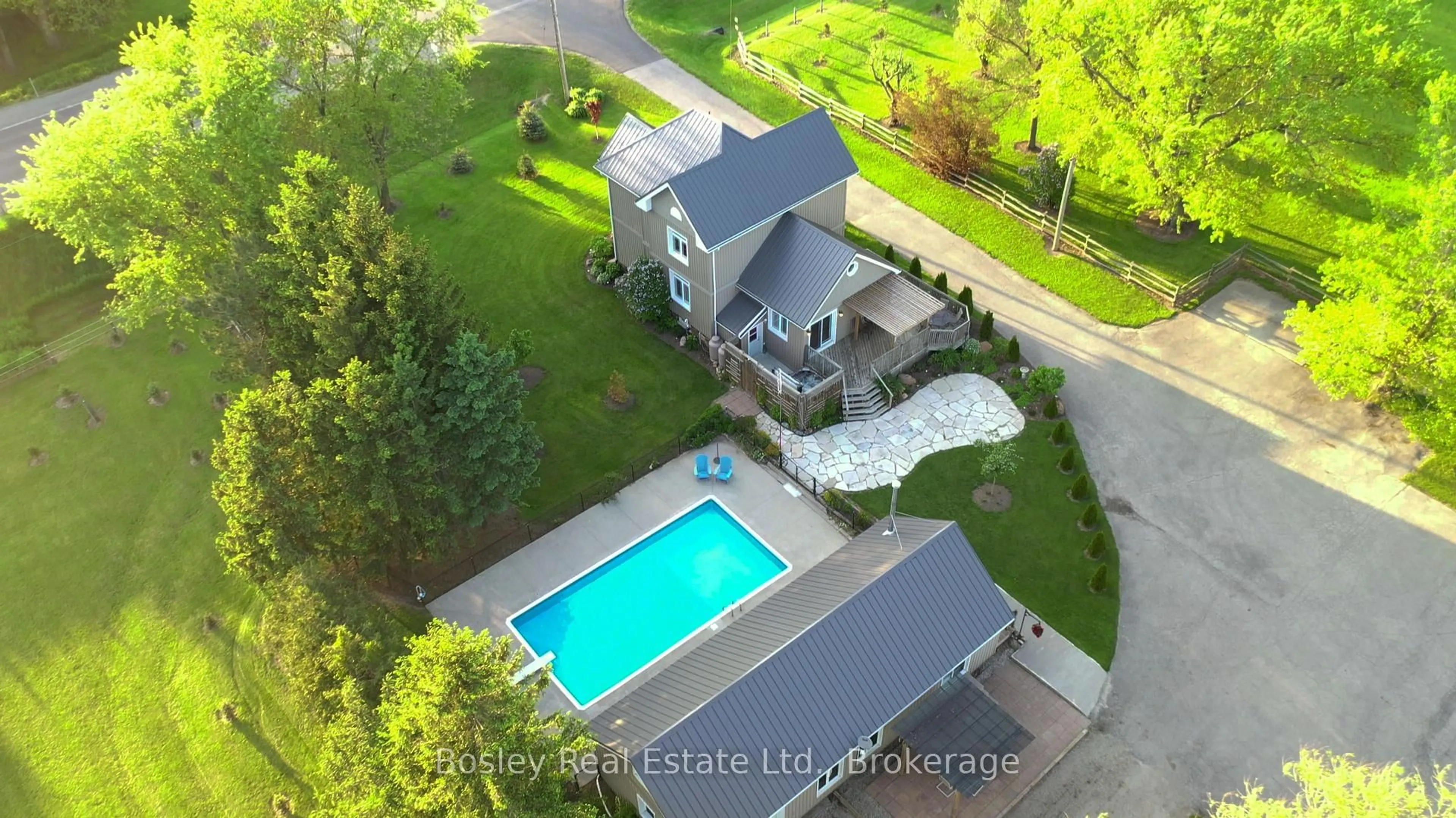 A pic from outside/outdoor area/front of a property/back of a property/a pic from drone, water/lake/river/ocean view for 2999 Road 119 RR #7, Perth South Ontario N4X 1C9