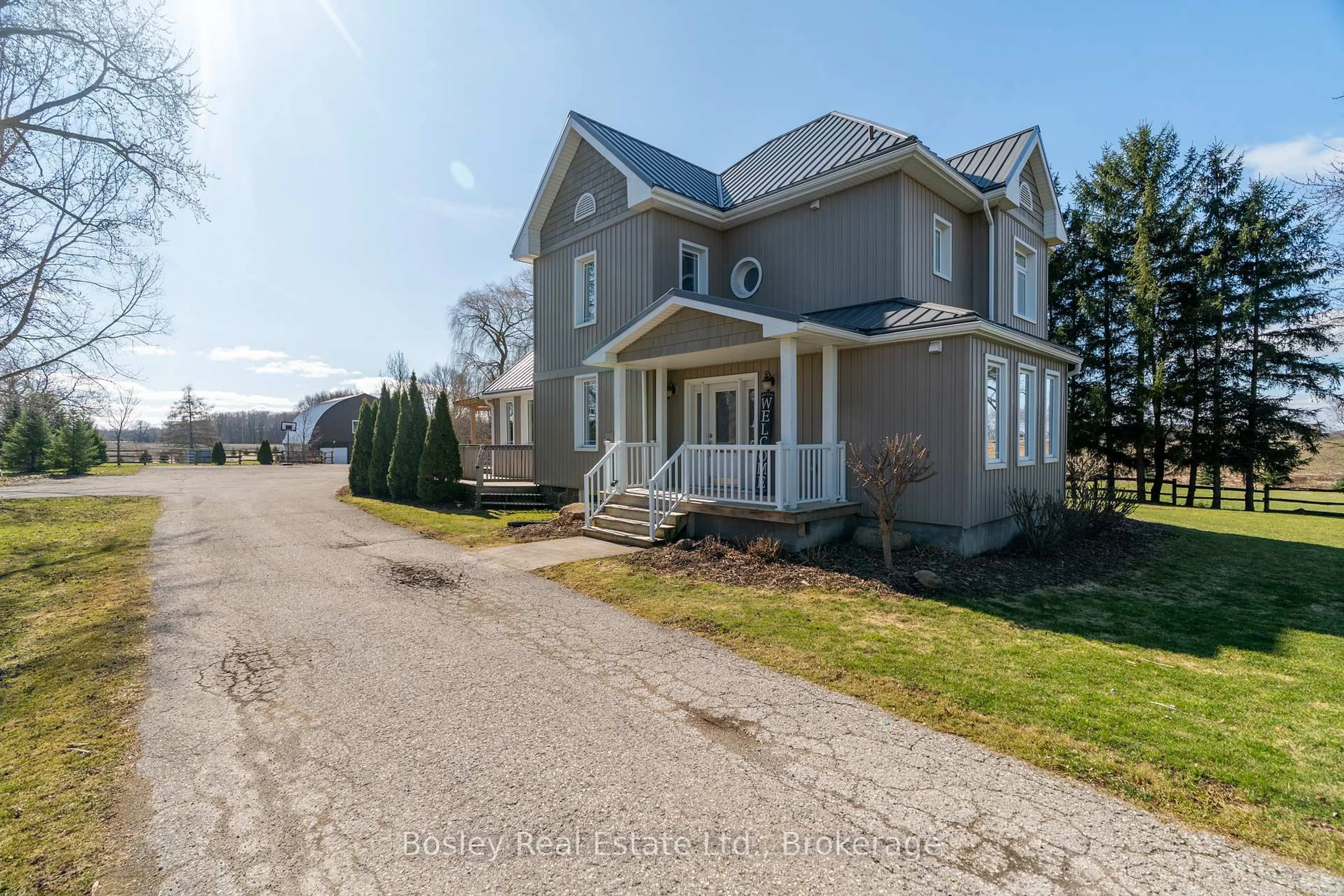 A pic from outside/outdoor area/front of a property/back of a property/a pic from drone, street for 2999 Road 119 RR #7, Perth South Ontario N4X 1C9