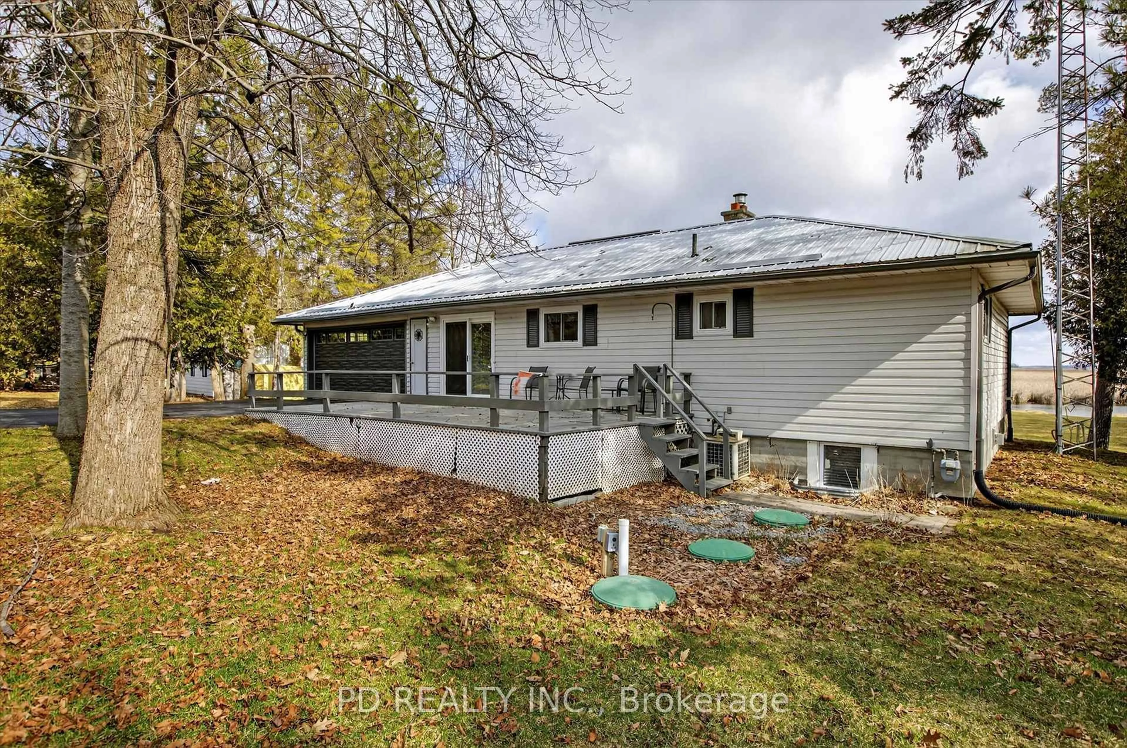 A pic from outside/outdoor area/front of a property/back of a property/a pic from drone, unknown for 200 Charlore Park Dr, Kawartha Lakes Ontario K0L 2W0