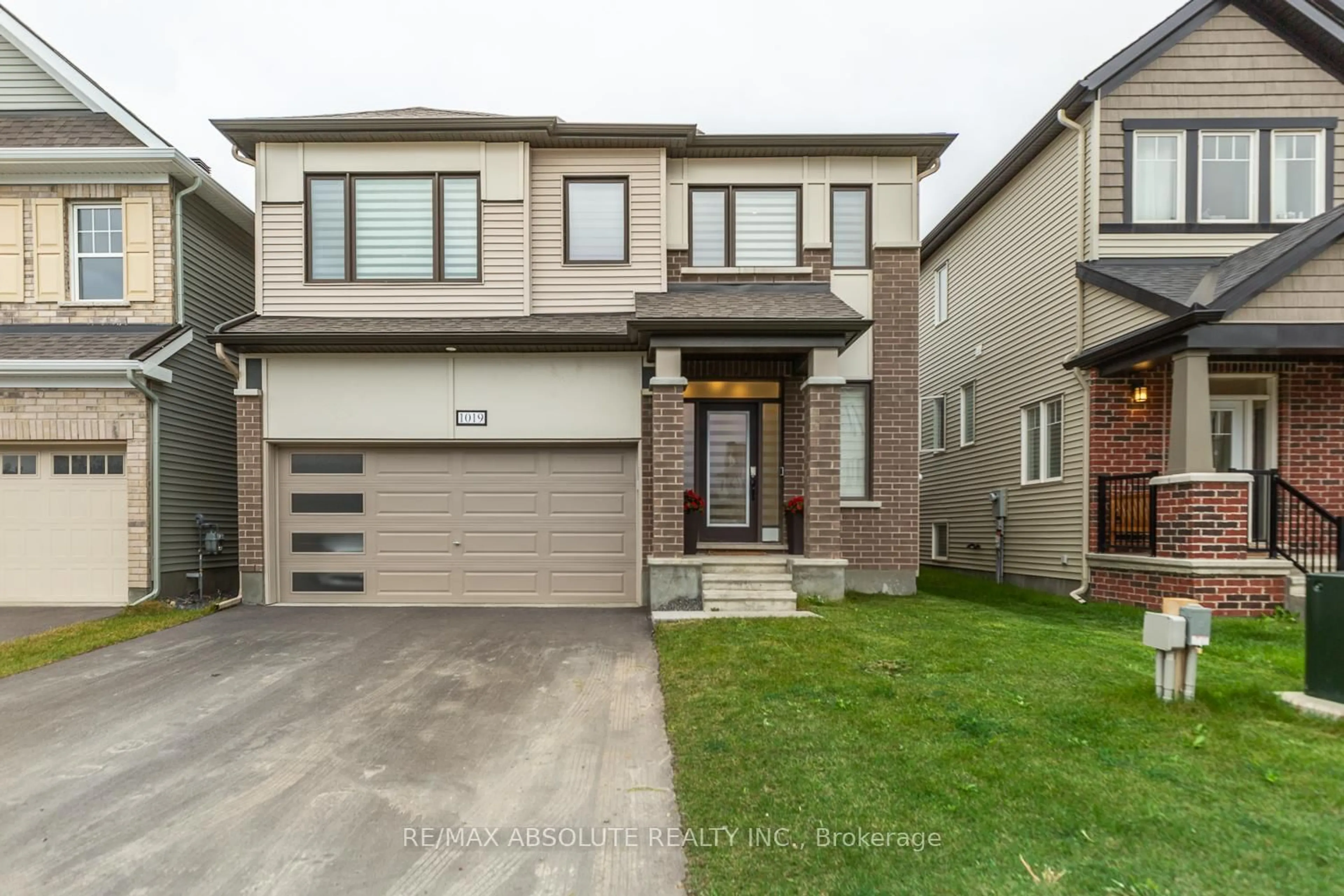 Home with brick exterior material, street for 1019 Apolune St, Ottawa Ontario K2J 6N8