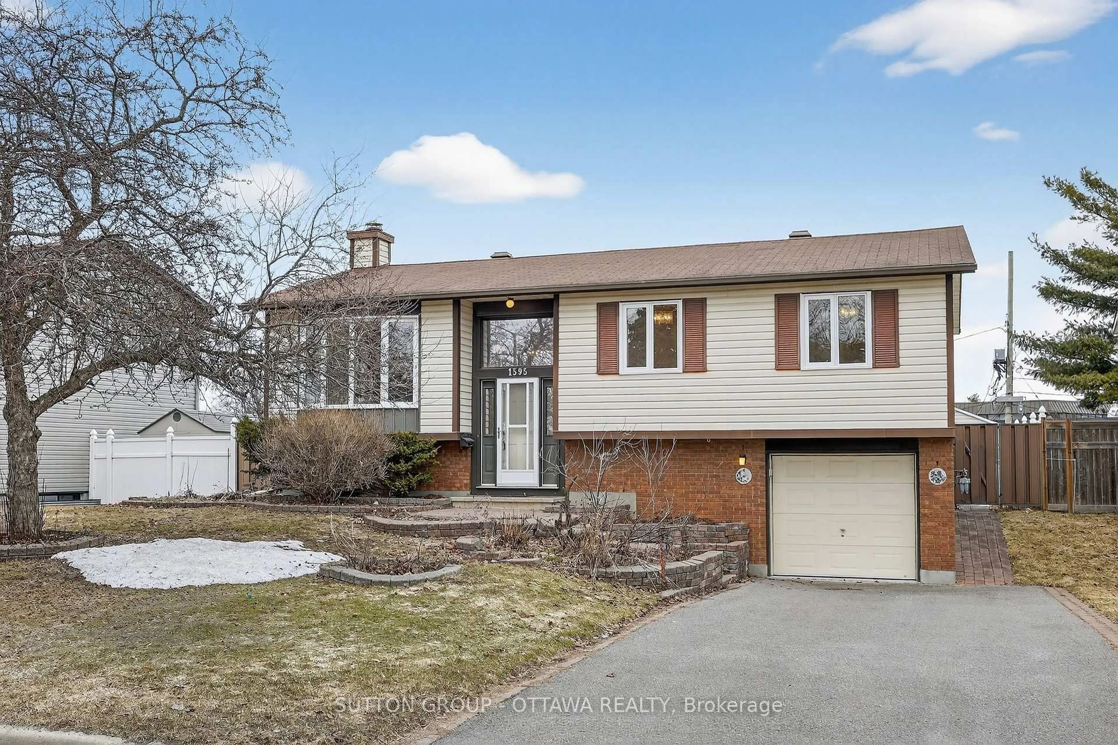 Home with vinyl exterior material, street for 1595 Schouten Dr, Orleans Ontario K1E 2H9