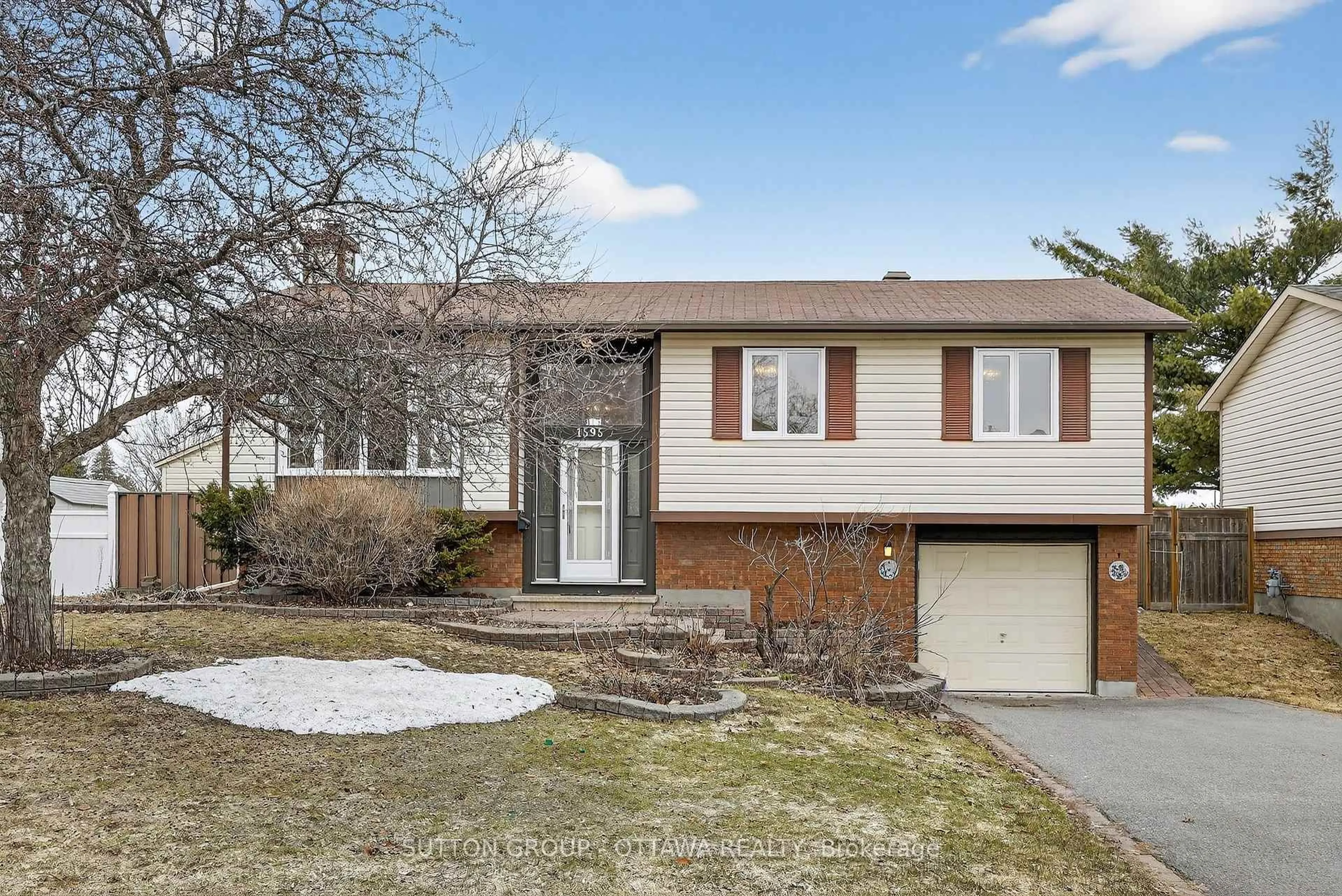 Home with vinyl exterior material, street for 1595 Schouten Dr, Orleans Ontario K1E 2H9