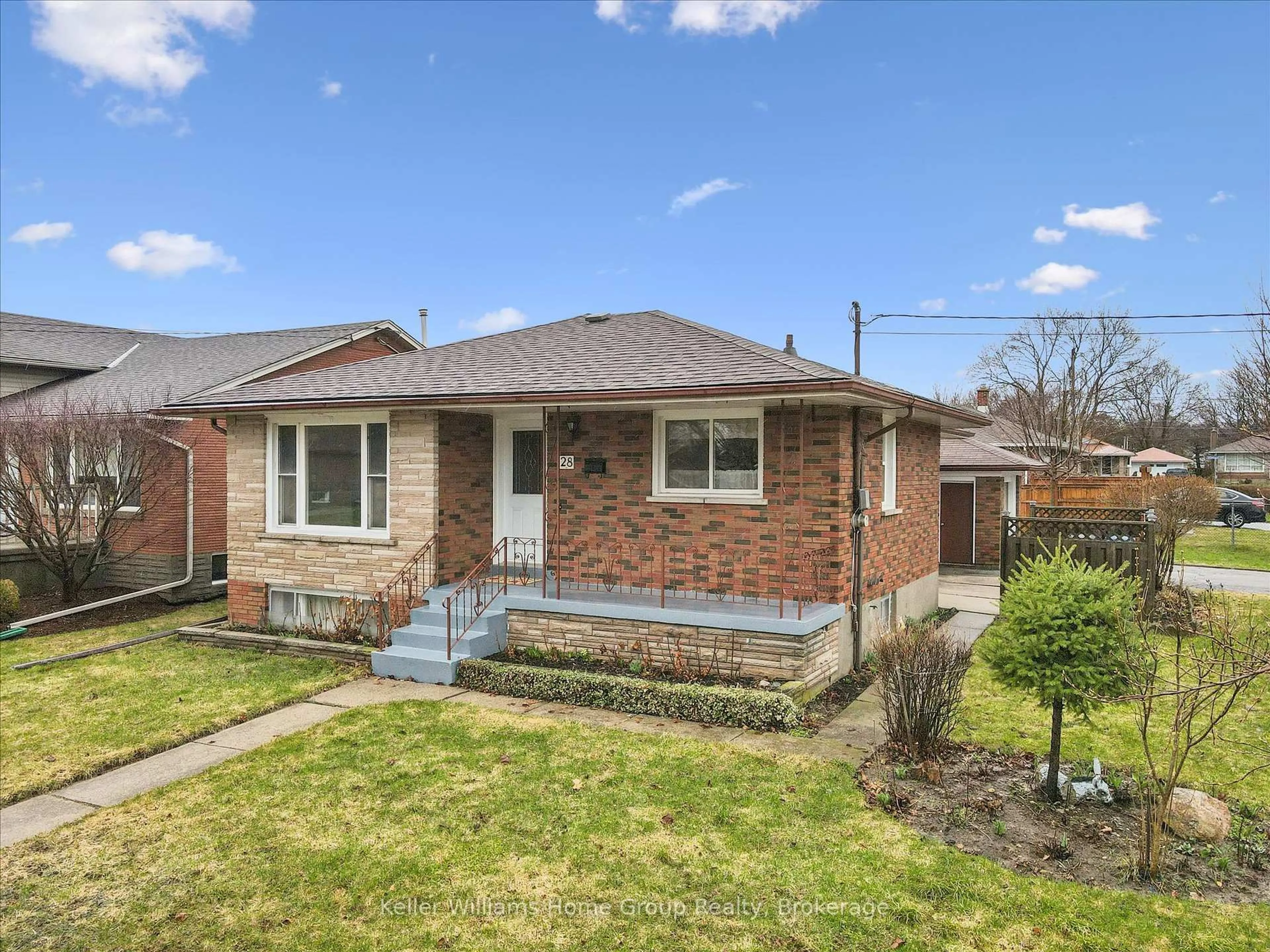 Home with brick exterior material, street for 28 Normandy Dr, Guelph Ontario N1E 2P4