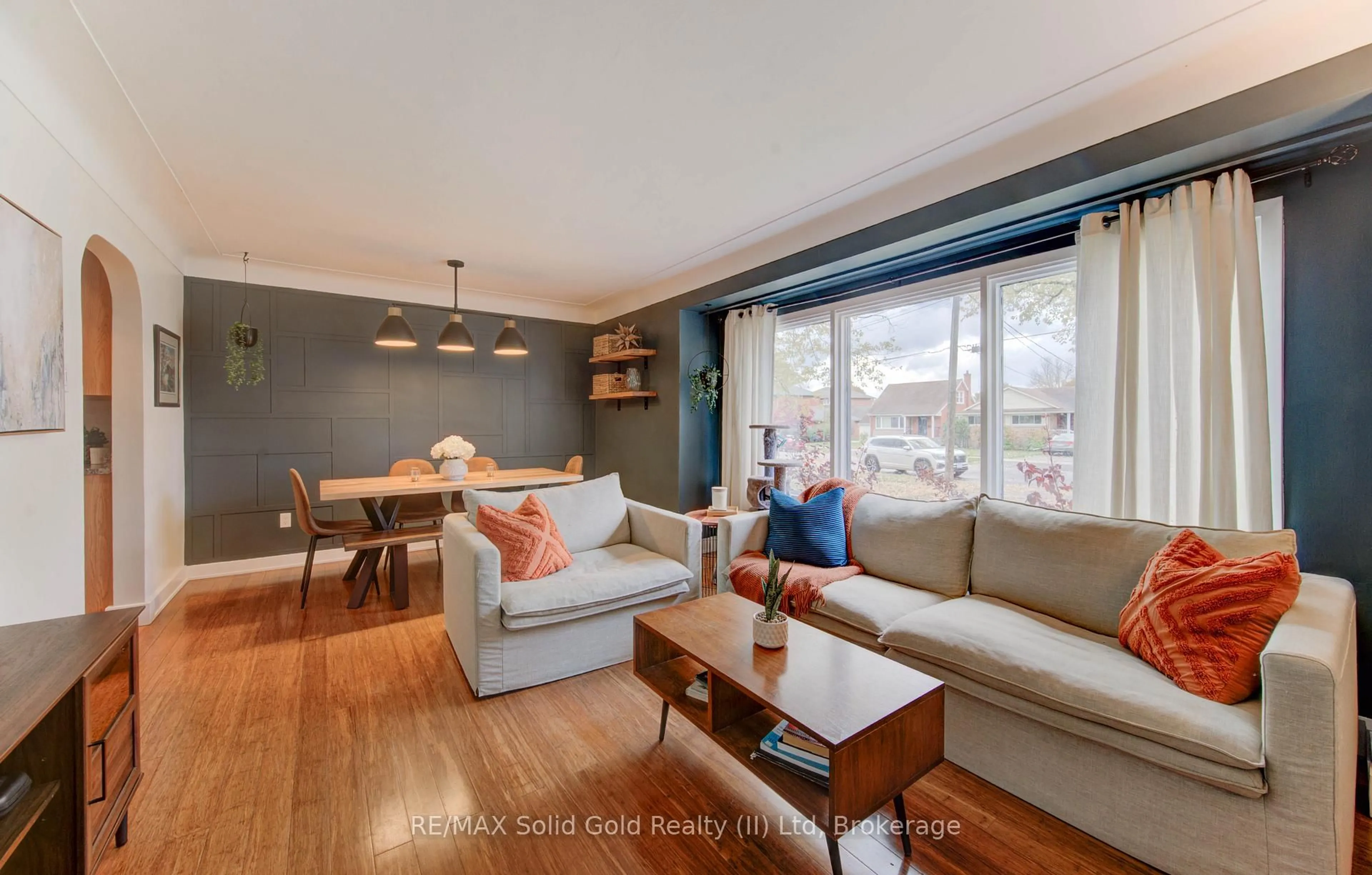 Living room with furniture, wood/laminate floor for 50 Edinburgh Rd, Kitchener Ontario N2B 1M5