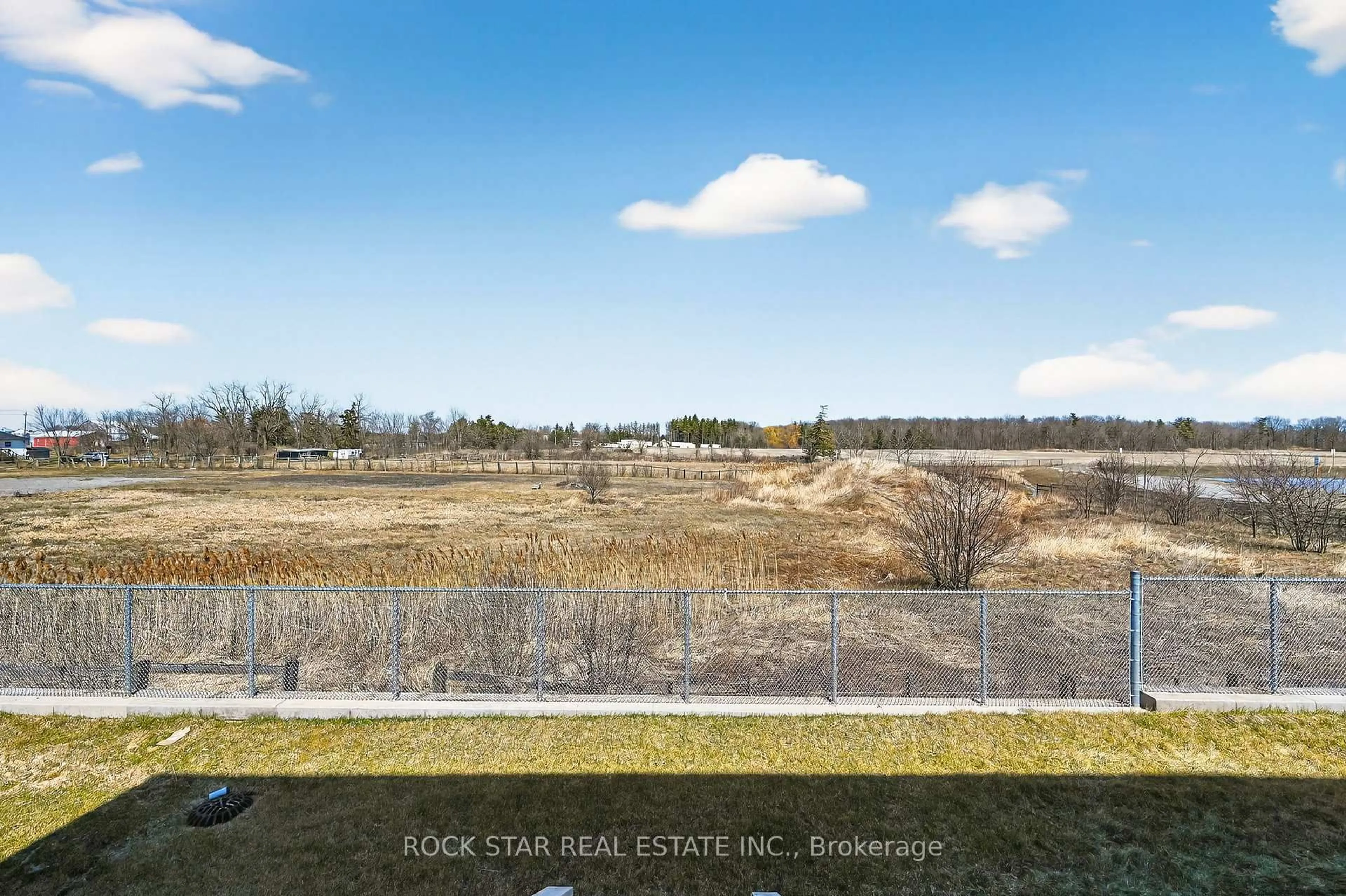 A pic from outside/outdoor area/front of a property/back of a property/a pic from drone, water/lake/river/ocean view for 63 Lloyd Davies Way, Hamilton Ontario L0R 1C0