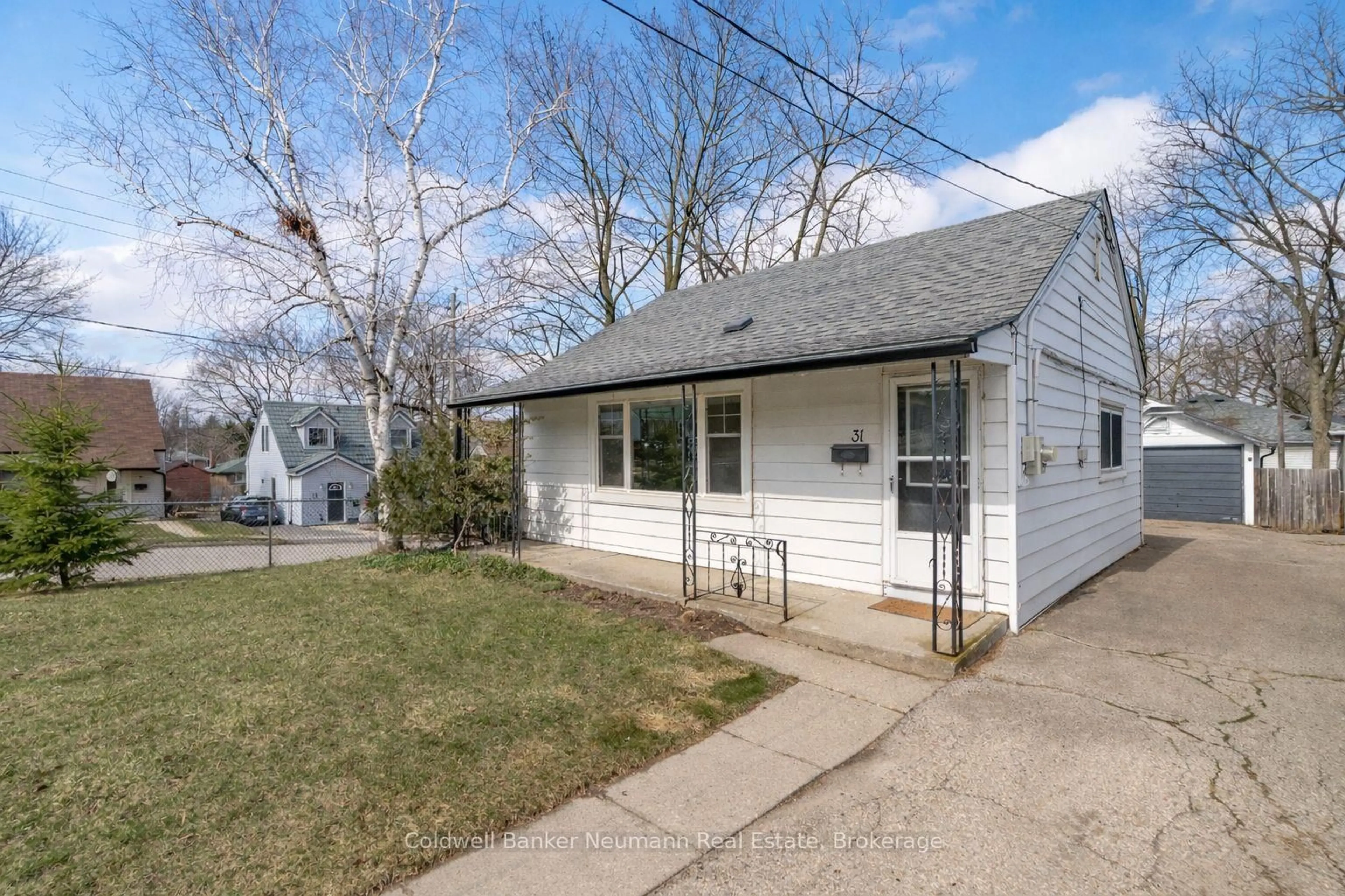 Home with vinyl exterior material, street for 31 Dunkirk Ave, Guelph Ontario N1E 4N7