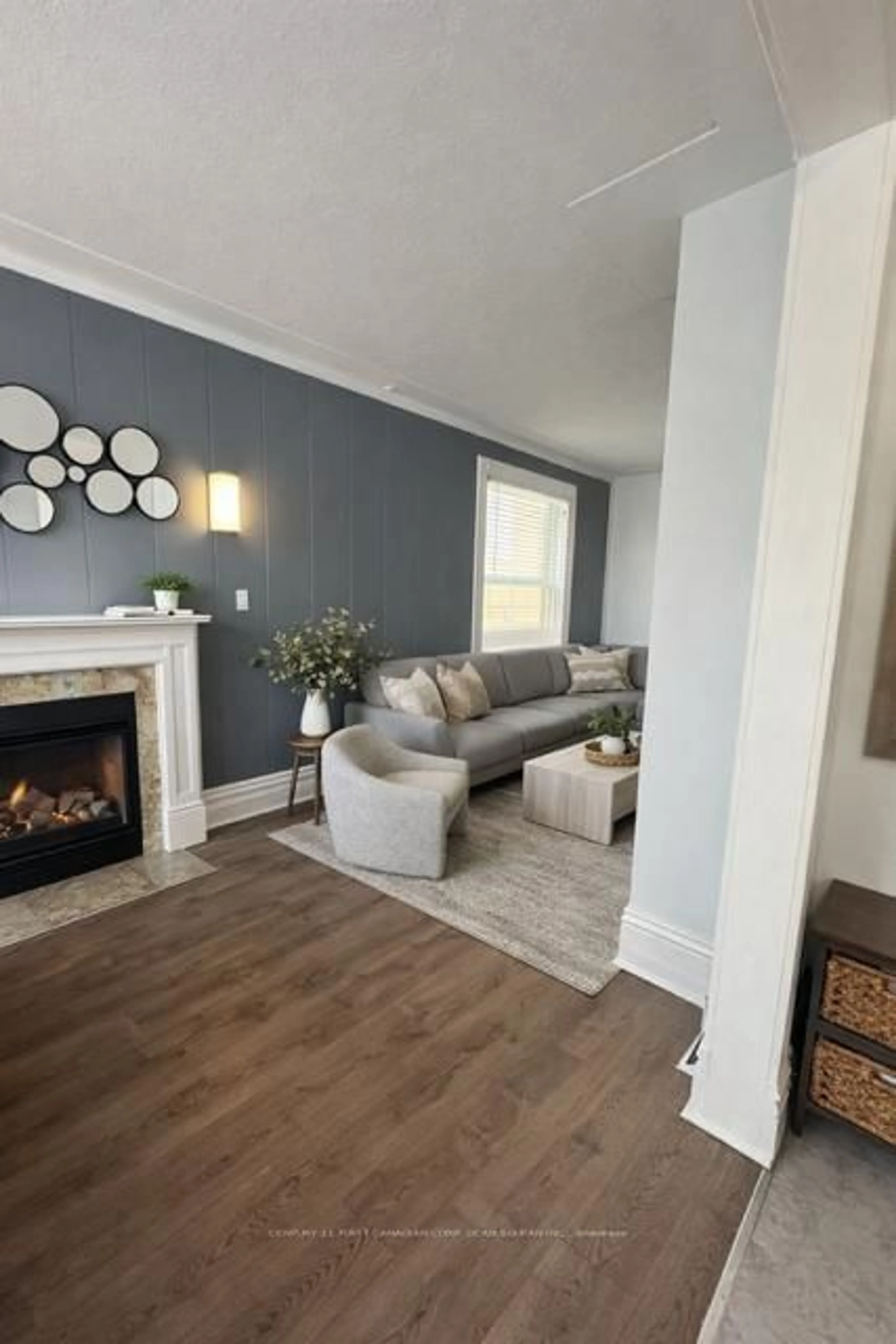 Living room with furniture, wood/laminate floor for 177 Central Ave, London East Ontario N6A 1M6