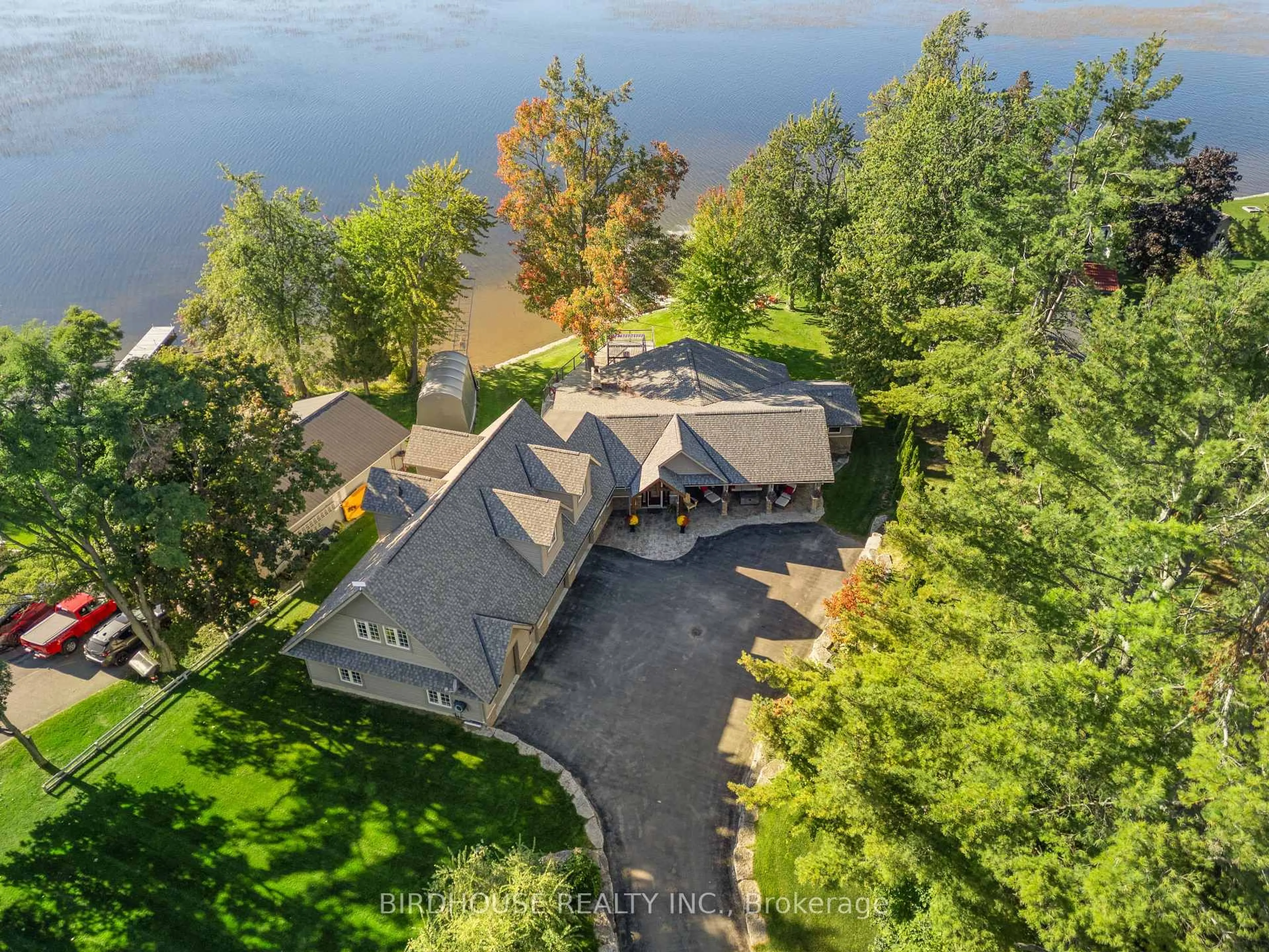 A pic from outside/outdoor area/front of a property/back of a property/a pic from drone, water/lake/river/ocean view for 1358 Island View Dr, Selwyn Ontario K0L 1T0