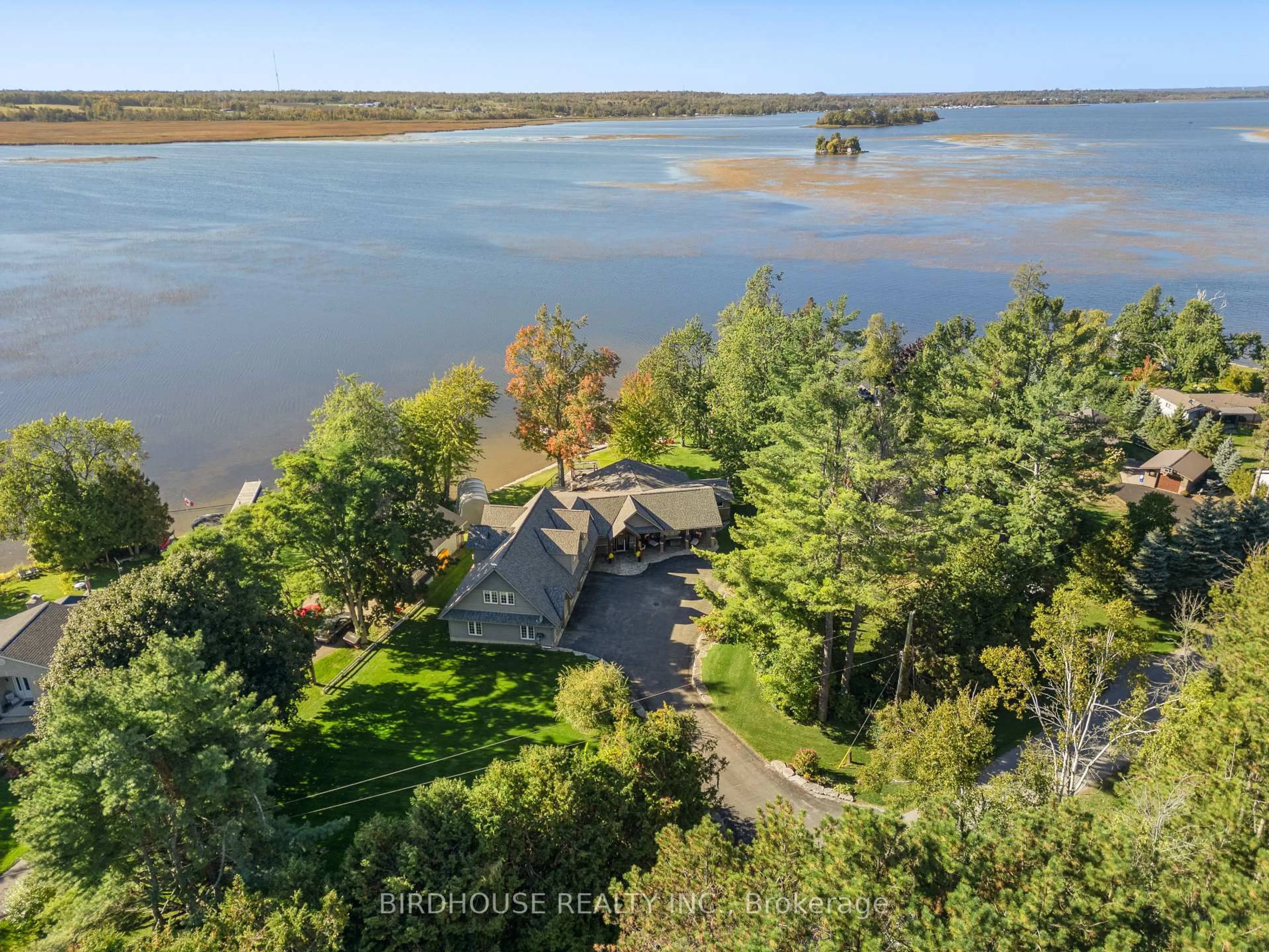 A pic from outside/outdoor area/front of a property/back of a property/a pic from drone, water/lake/river/ocean view for 1358 Island View Dr, Selwyn Ontario K0L 1T0