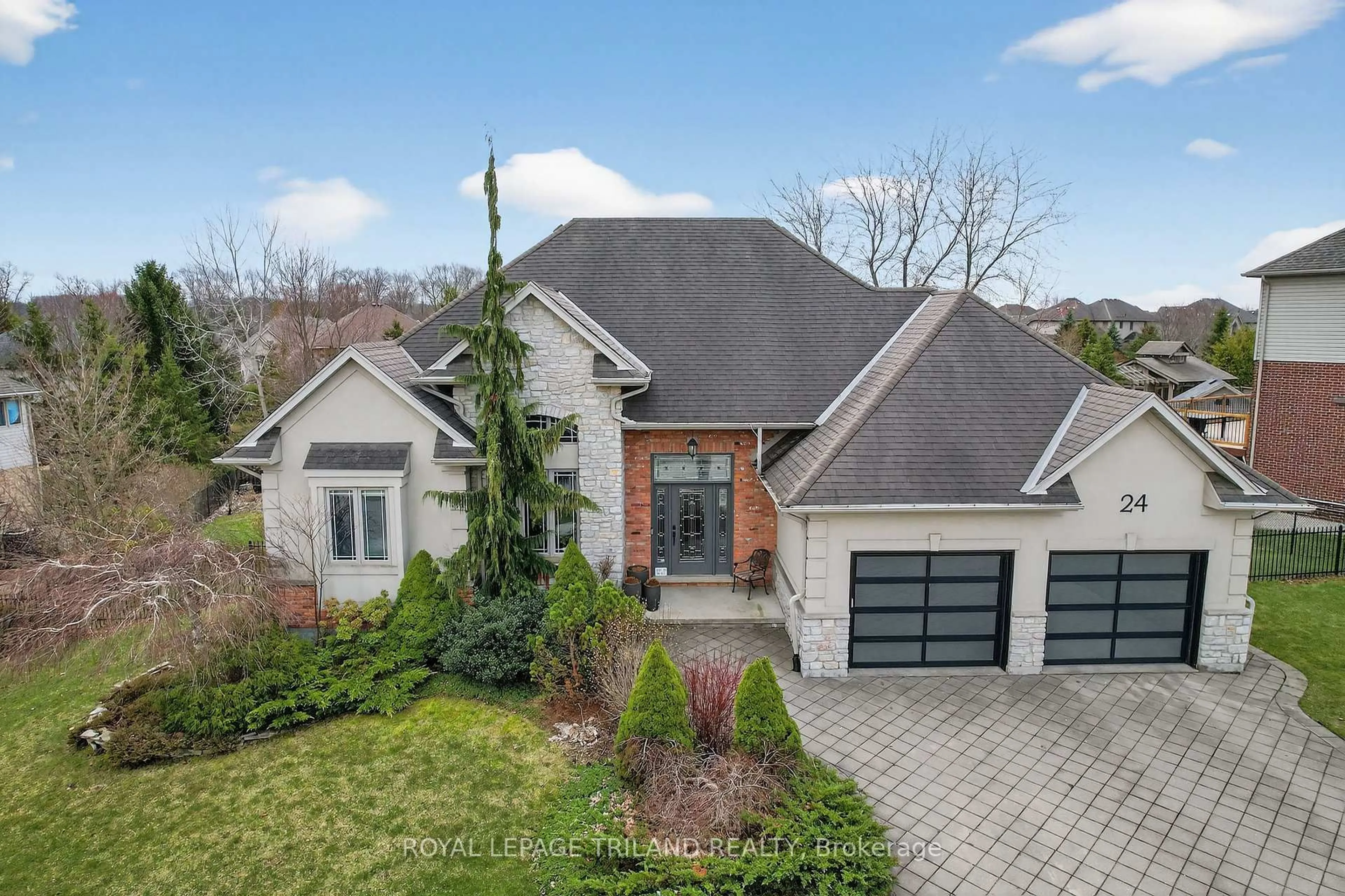 Home with brick exterior material, street for 24 Earlscourt Terr, Middlesex Centre Ontario N0L 1R0