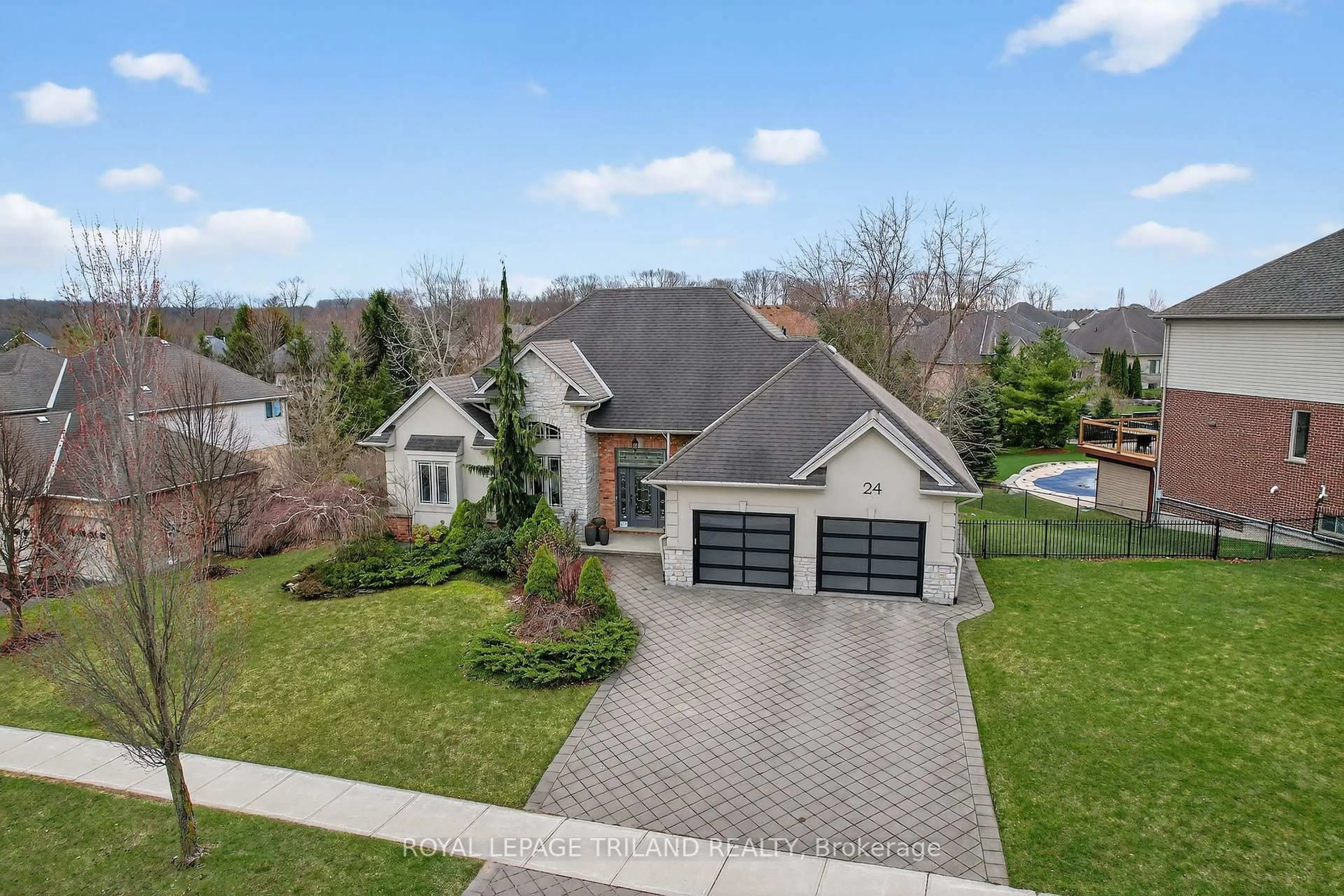 A pic from outside/outdoor area/front of a property/back of a property/a pic from drone, street for 24 Earlscourt Terr, Middlesex Centre Ontario N0L 1R0