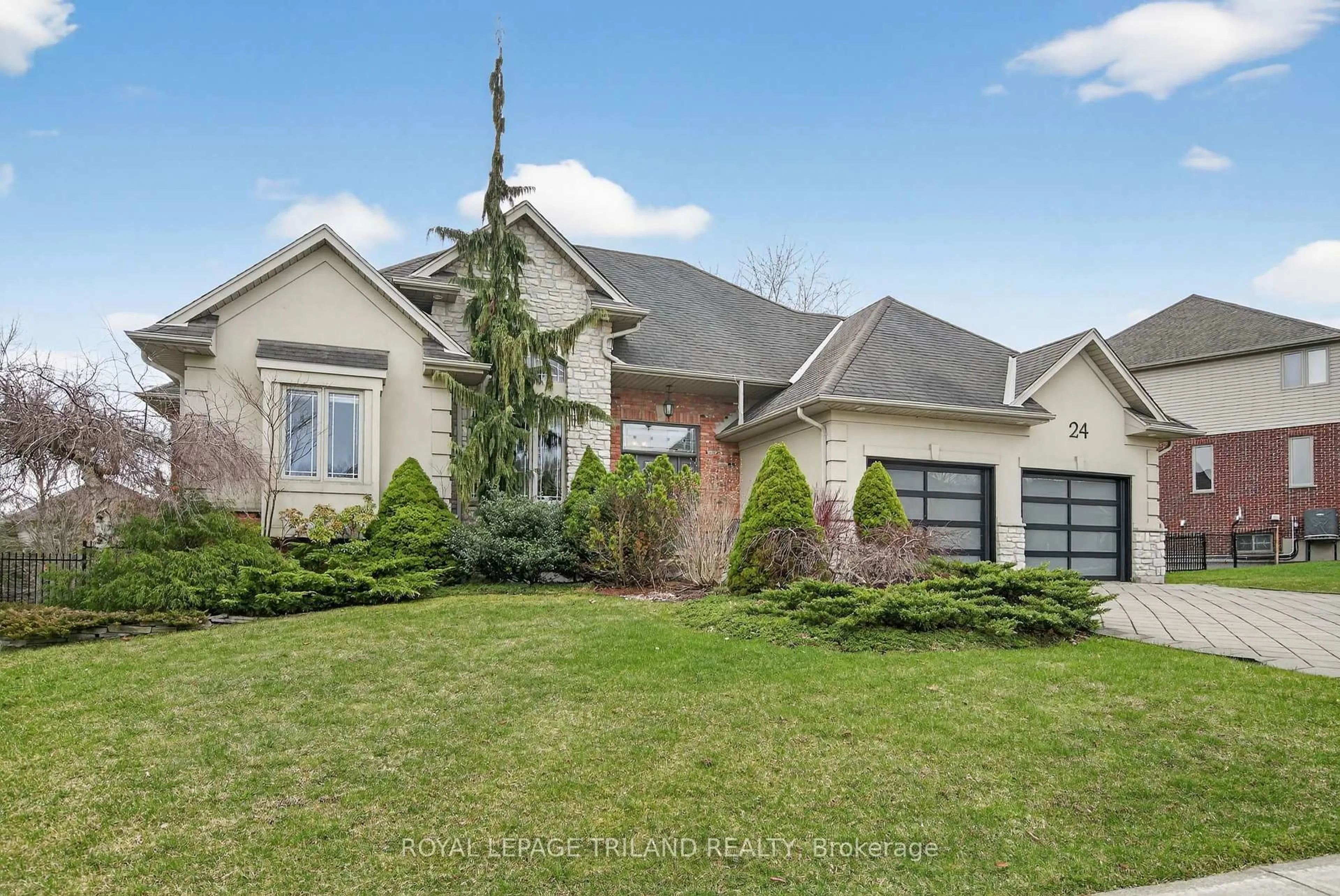 Home with brick exterior material, street for 24 Earlscourt Terr, Middlesex Centre Ontario N0L 1R0