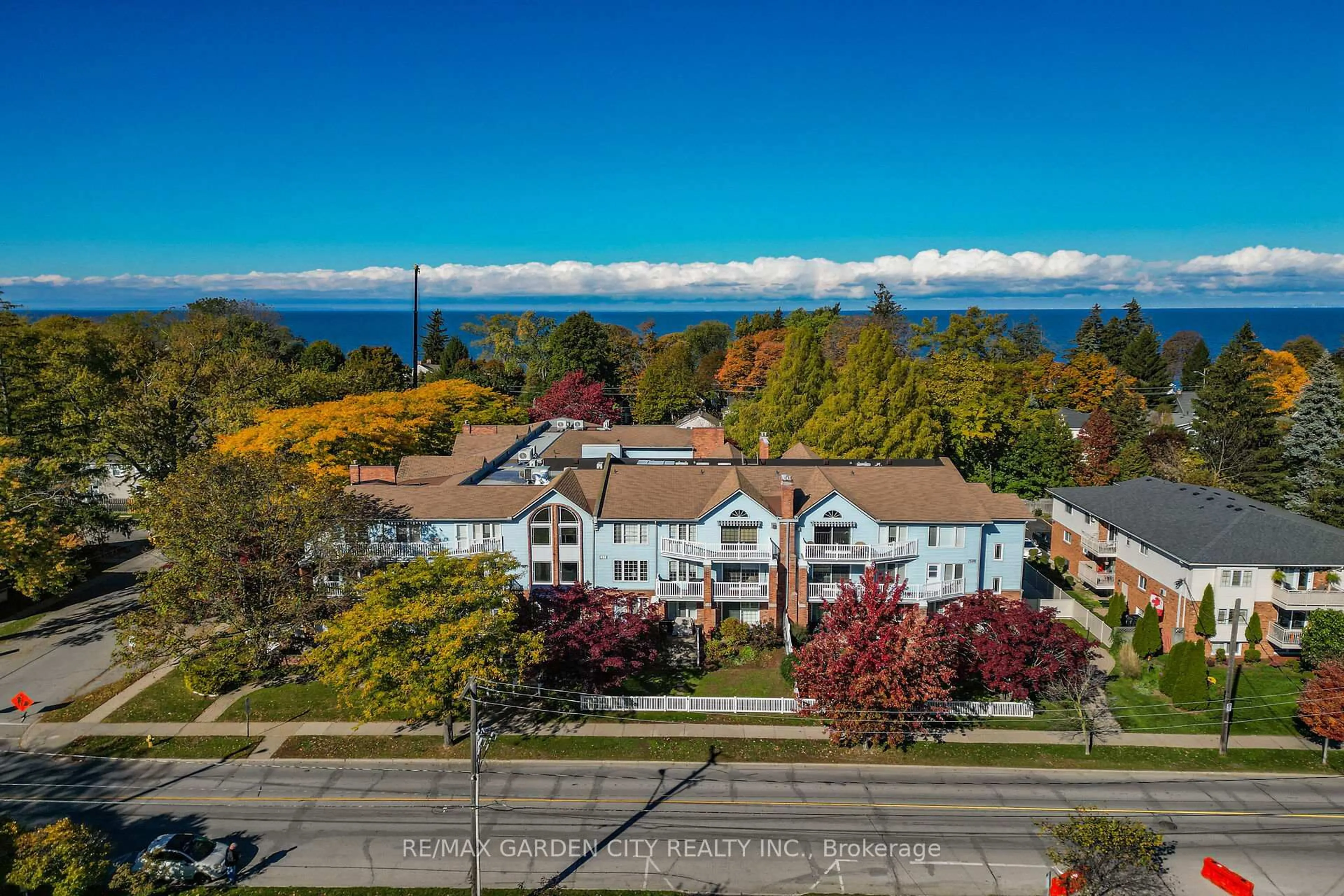 A pic from outside/outdoor area/front of a property/back of a property/a pic from drone, water/lake/river/ocean view for 70 Main St #201, St. Catharines Ontario L2N 4T9