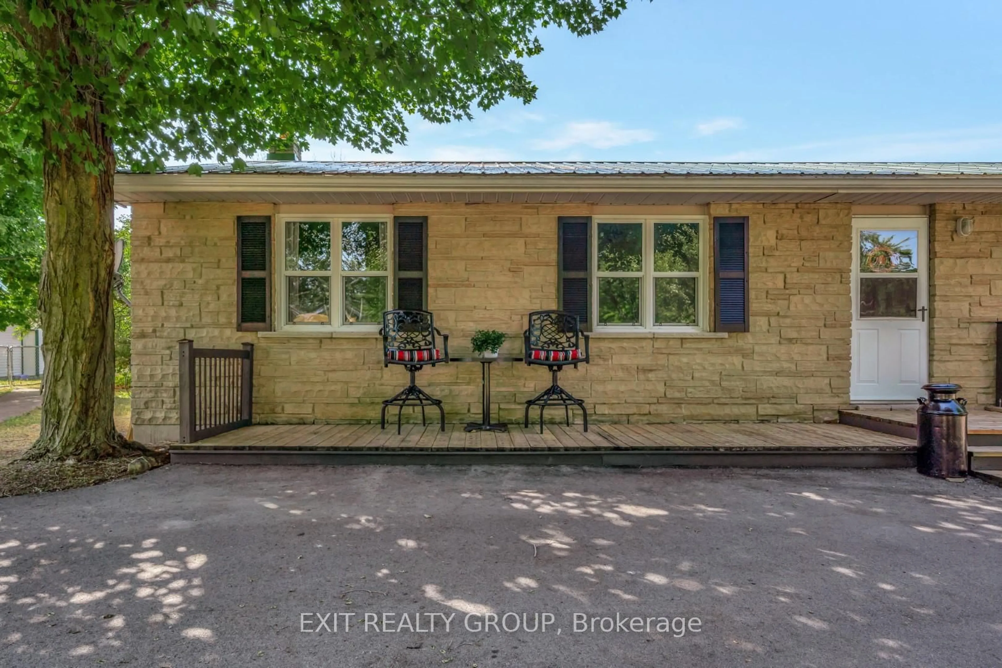 A pic from outside/outdoor area/front of a property/back of a property/a pic from drone, street for 1476 County Rd 12, Prince Edward County Ontario K0K 2T0