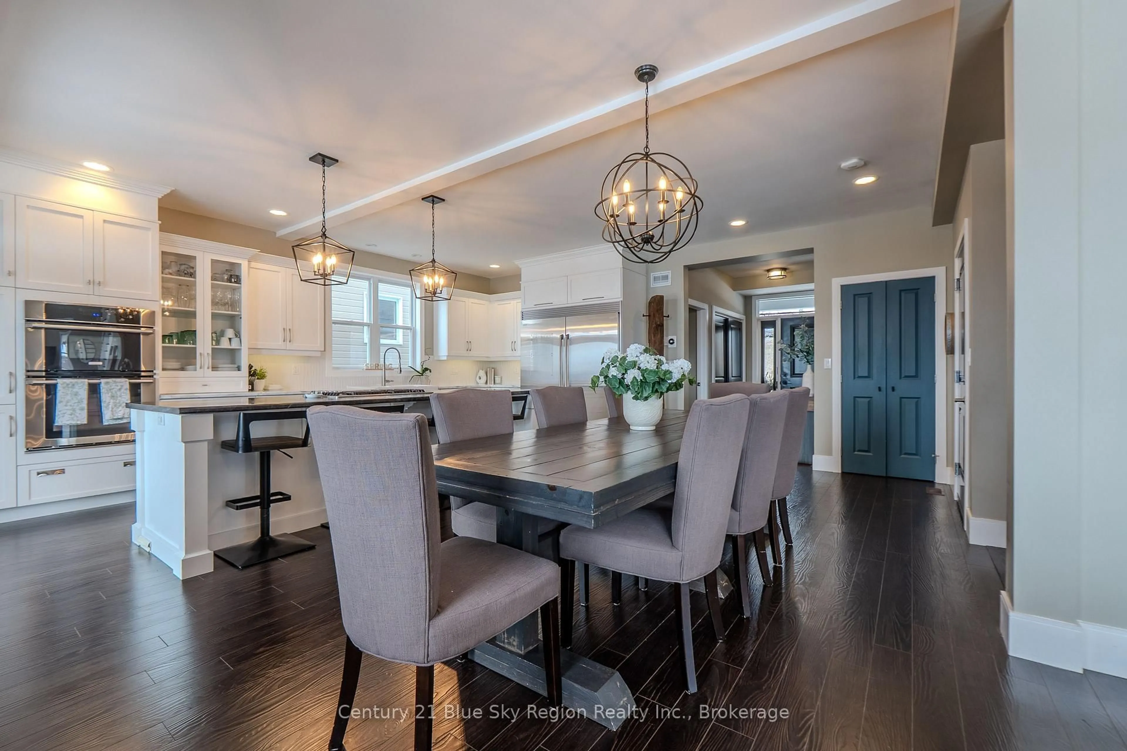 Open concept kitchen, wood/laminate floor for 723 Mclaren St, North Bay Ontario P1B 3M1