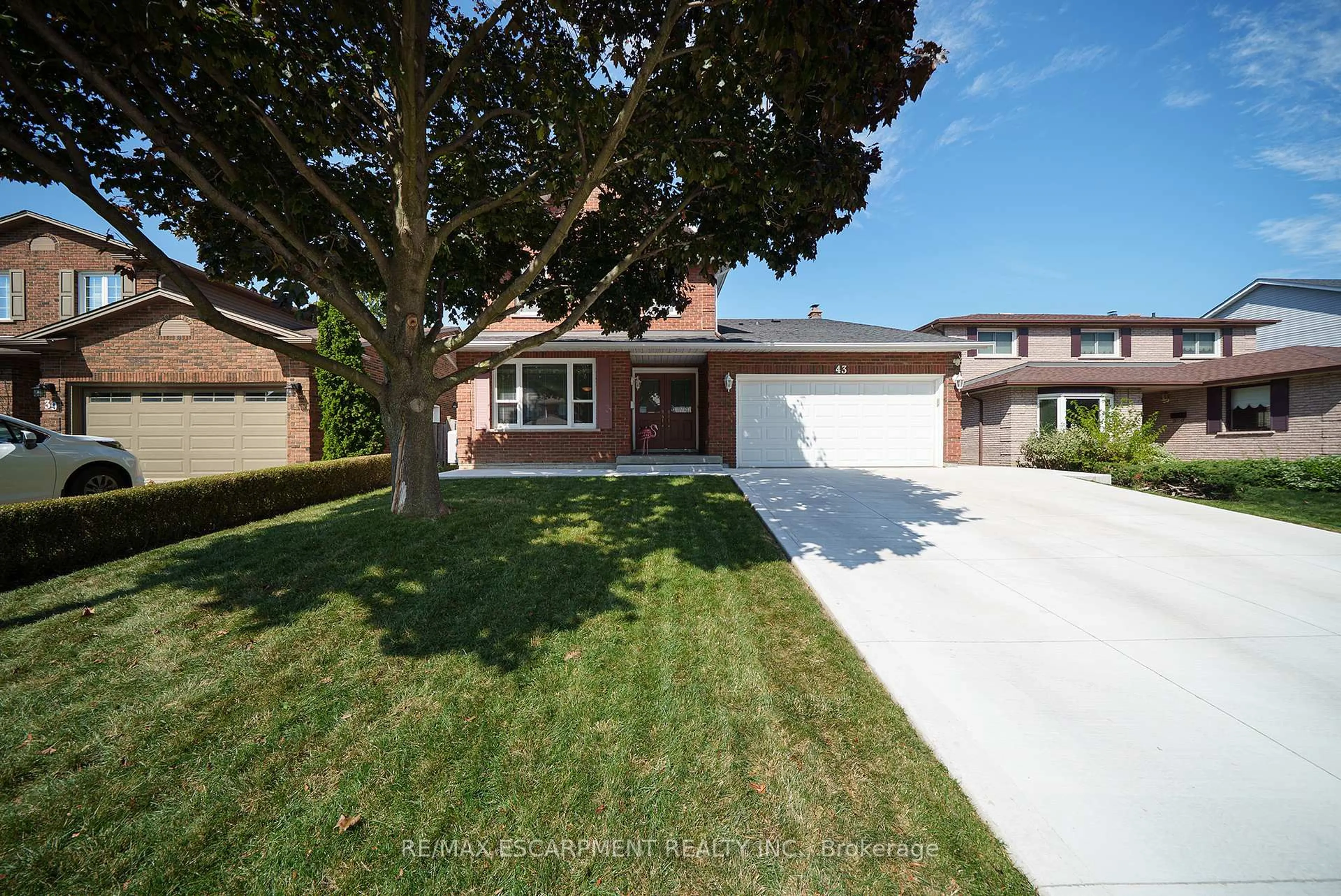 Home with brick exterior material, street for 43 Flamingo Dr, Hamilton Ontario L9A 4X6