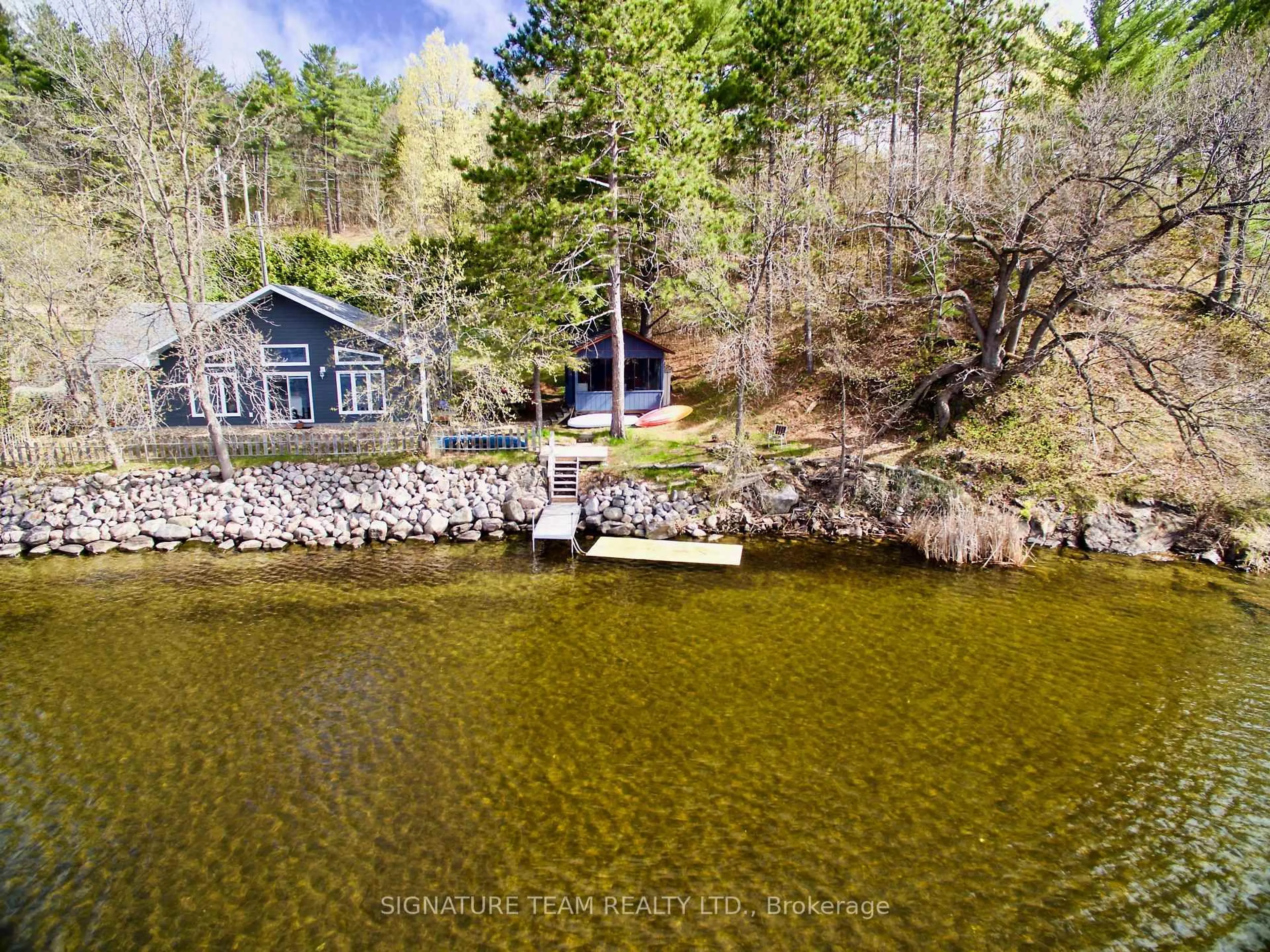 A pic from outside/outdoor area/front of a property/back of a property/a pic from drone, water/lake/river/ocean view for 321A Lake Dore Rd, Golden Lake Ontario K0J 1X0