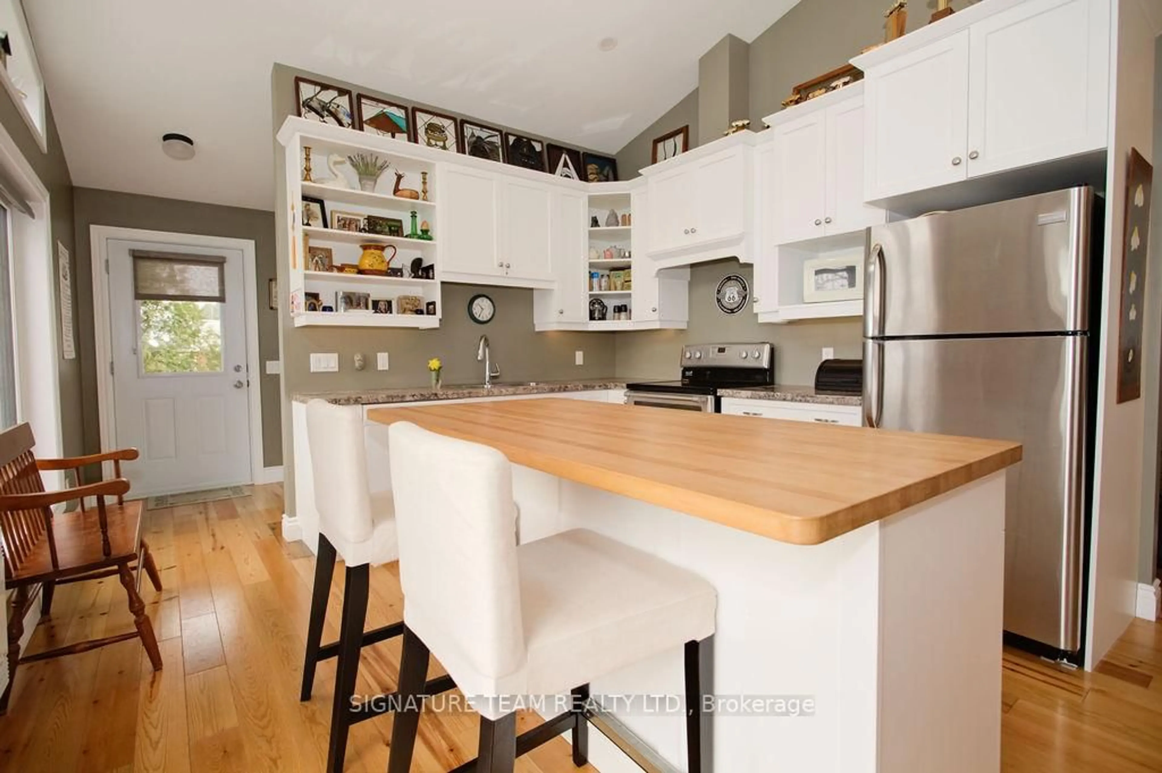 Open concept kitchen, wood/laminate floor for 321A Lake Dore Rd, Golden Lake Ontario K0J 1X0