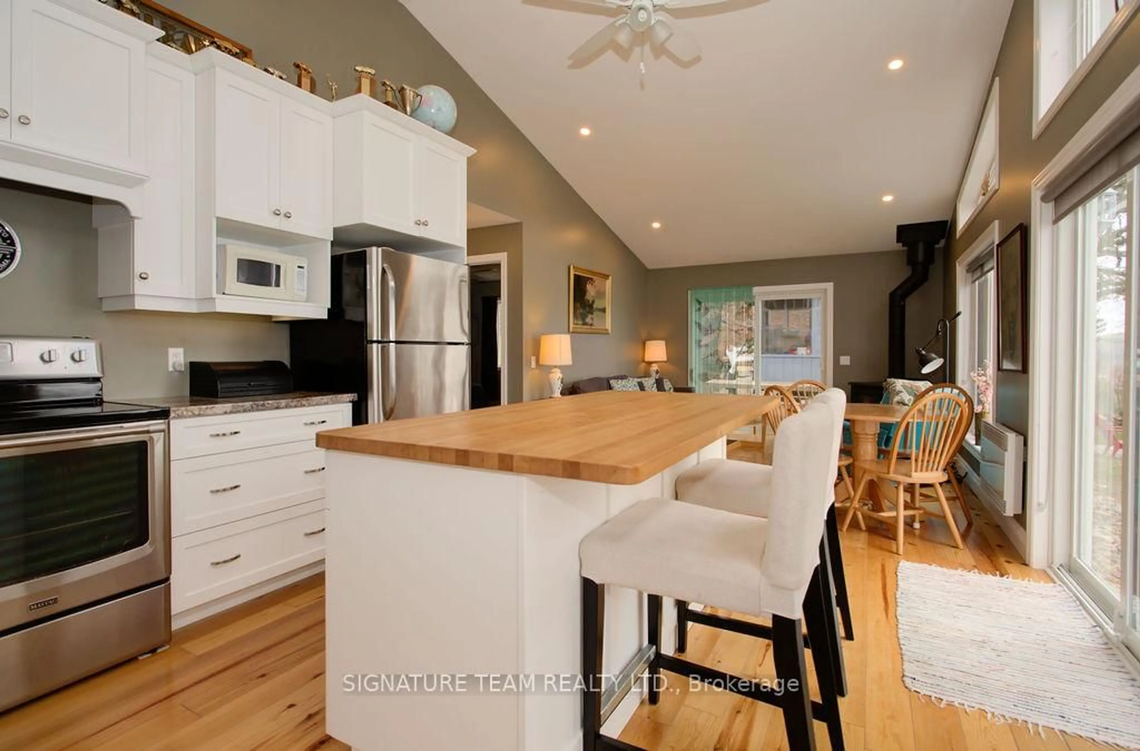 Open concept kitchen, wood/laminate floor for 321A Lake Dore Rd, Golden Lake Ontario K0J 1X0
