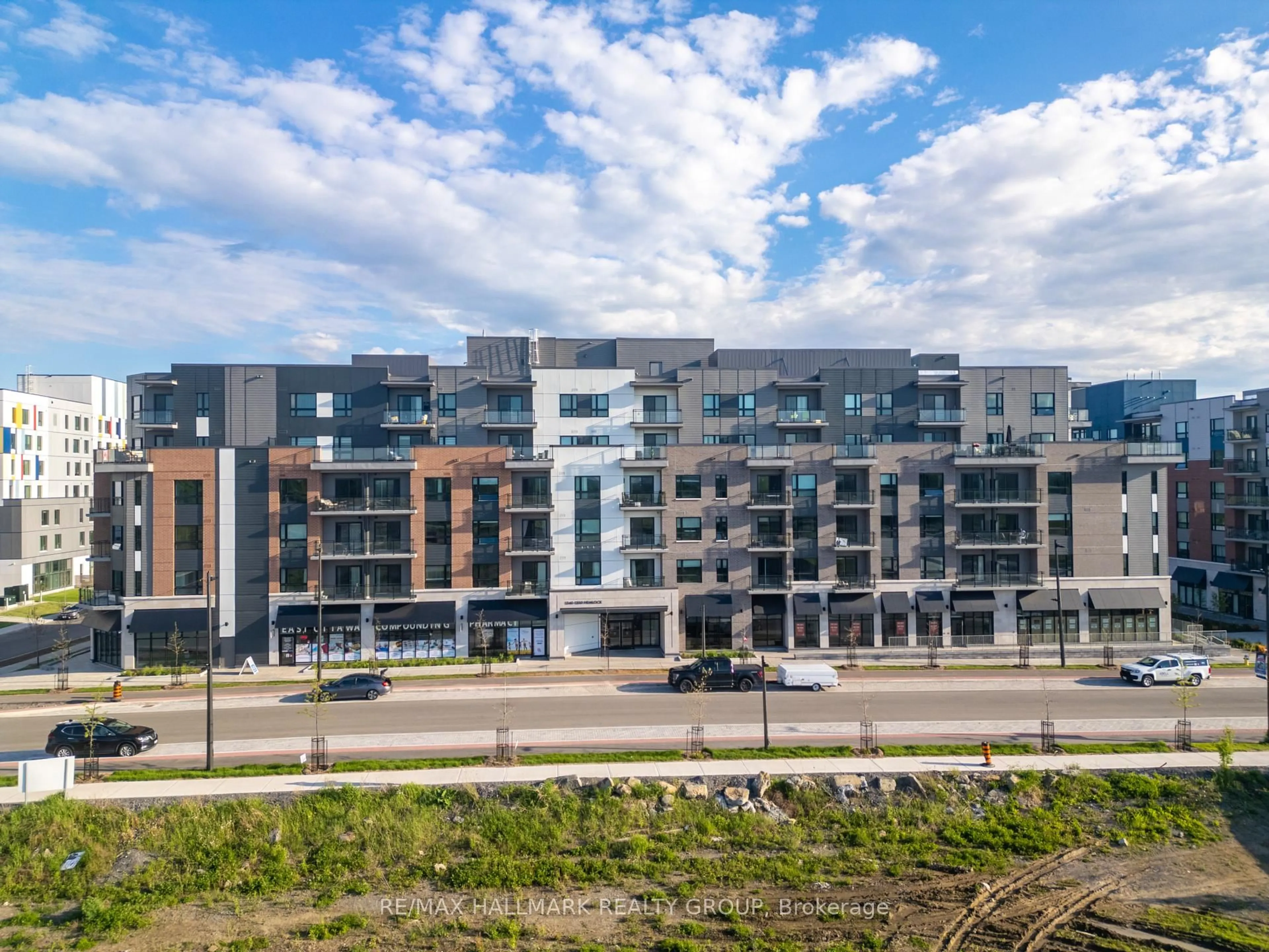 A pic from outside/outdoor area/front of a property/back of a property/a pic from drone, unknown for 1350 Hemlock Rd #202, Ottawa Ontario K1K 5C2